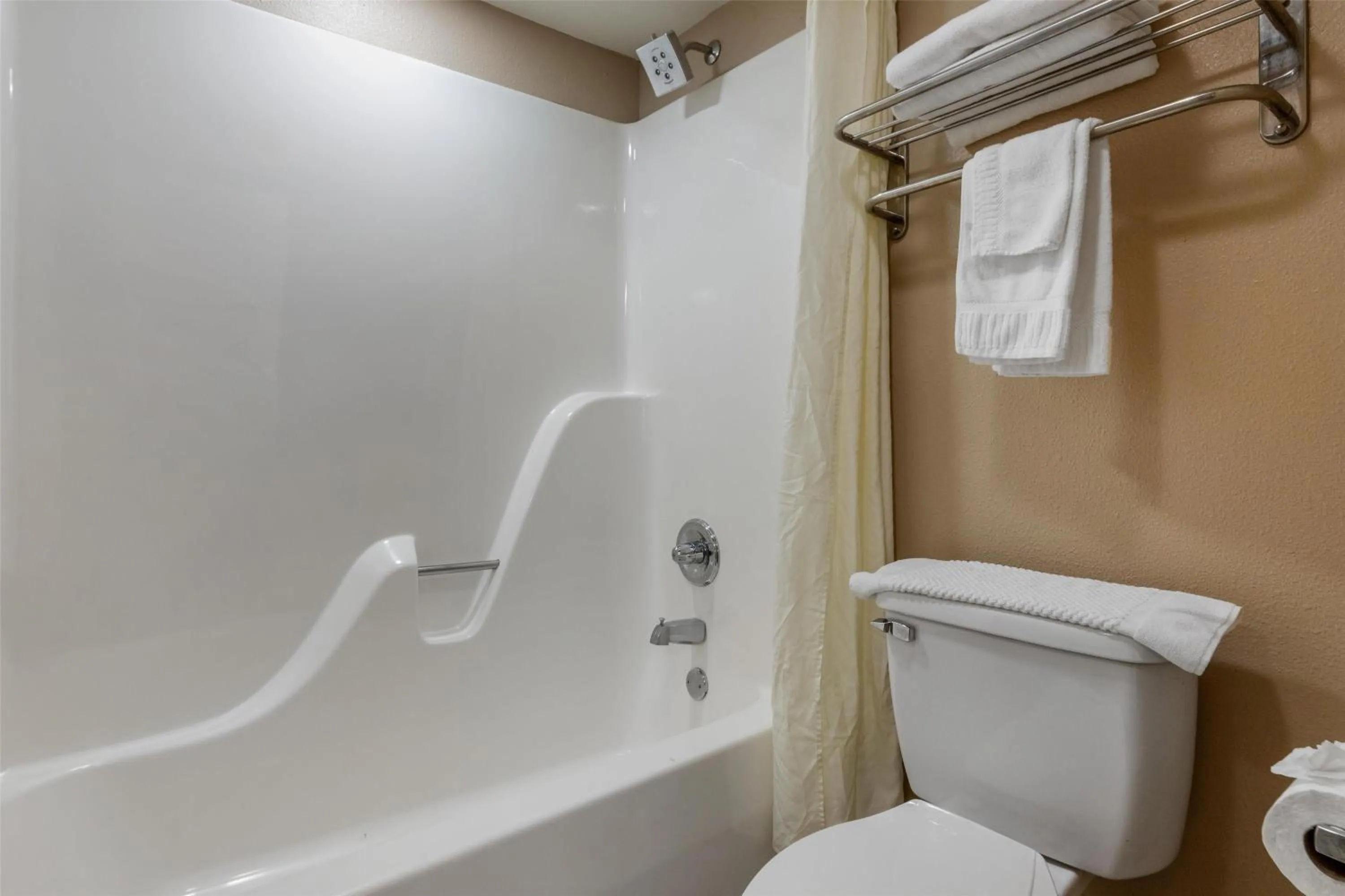 Bathroom in SureStay Plus Hotel by Best Western Poteau