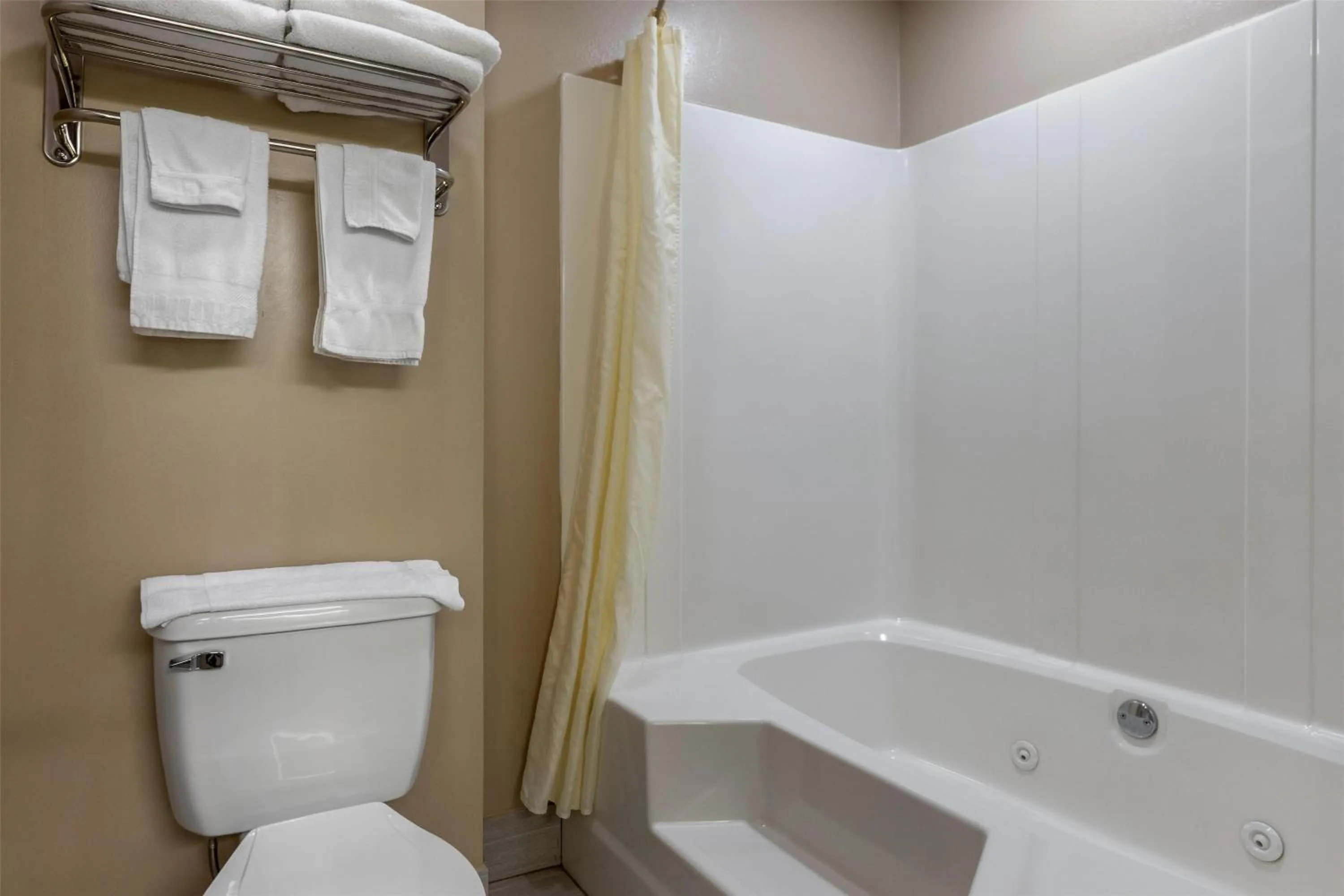 Bathroom in SureStay Plus Hotel by Best Western Poteau