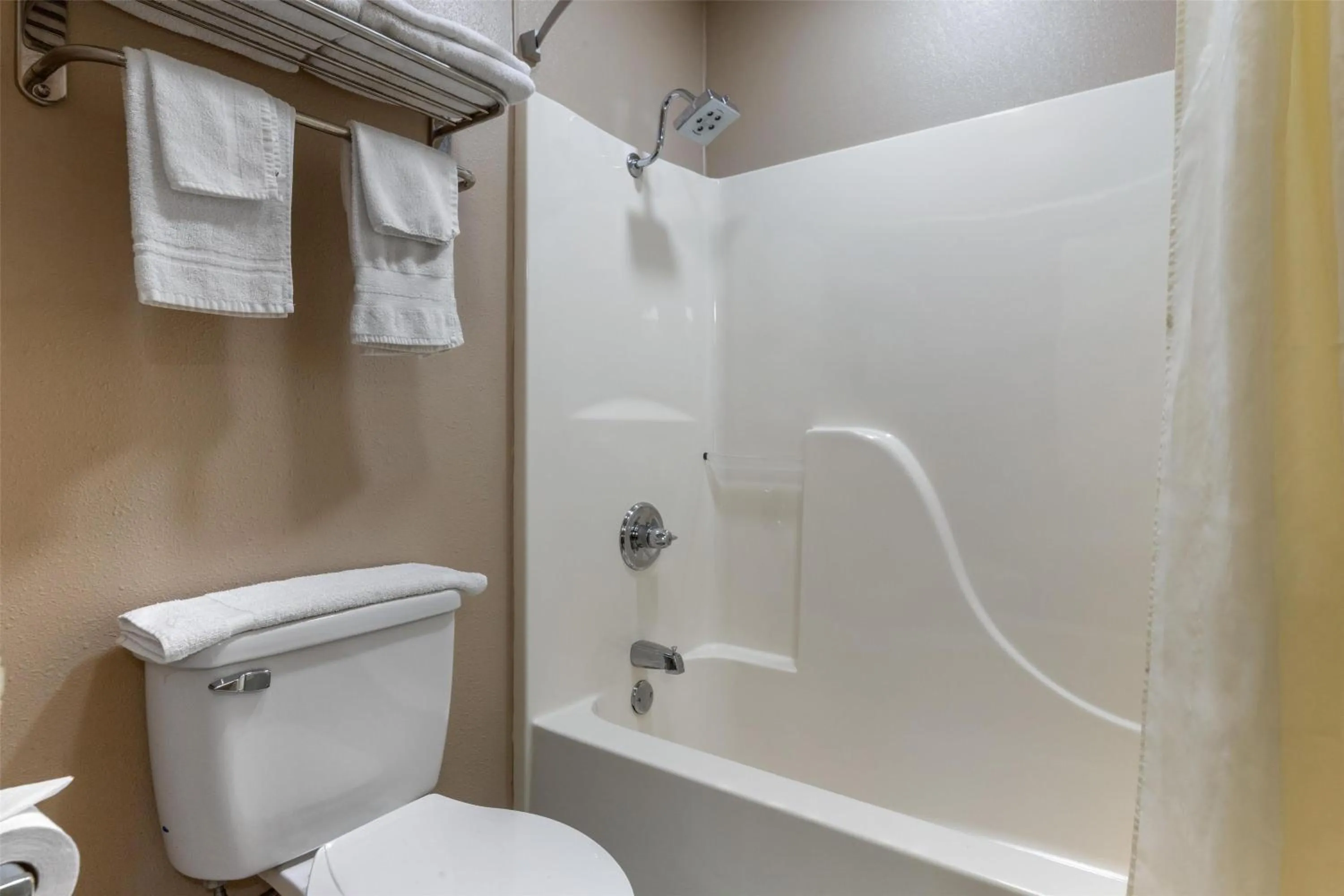 Bathroom in SureStay Plus Hotel by Best Western Poteau