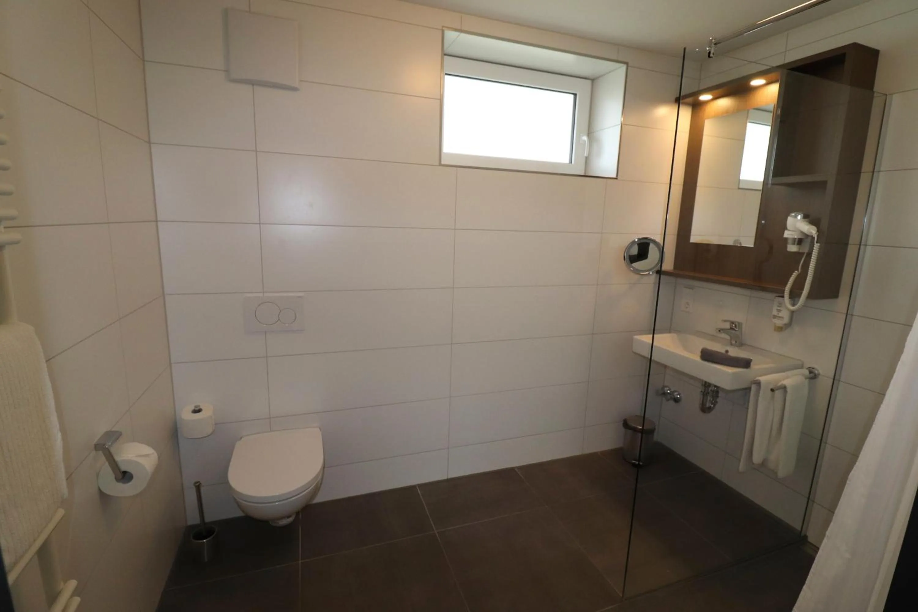 Bathroom in iQ-Hotel