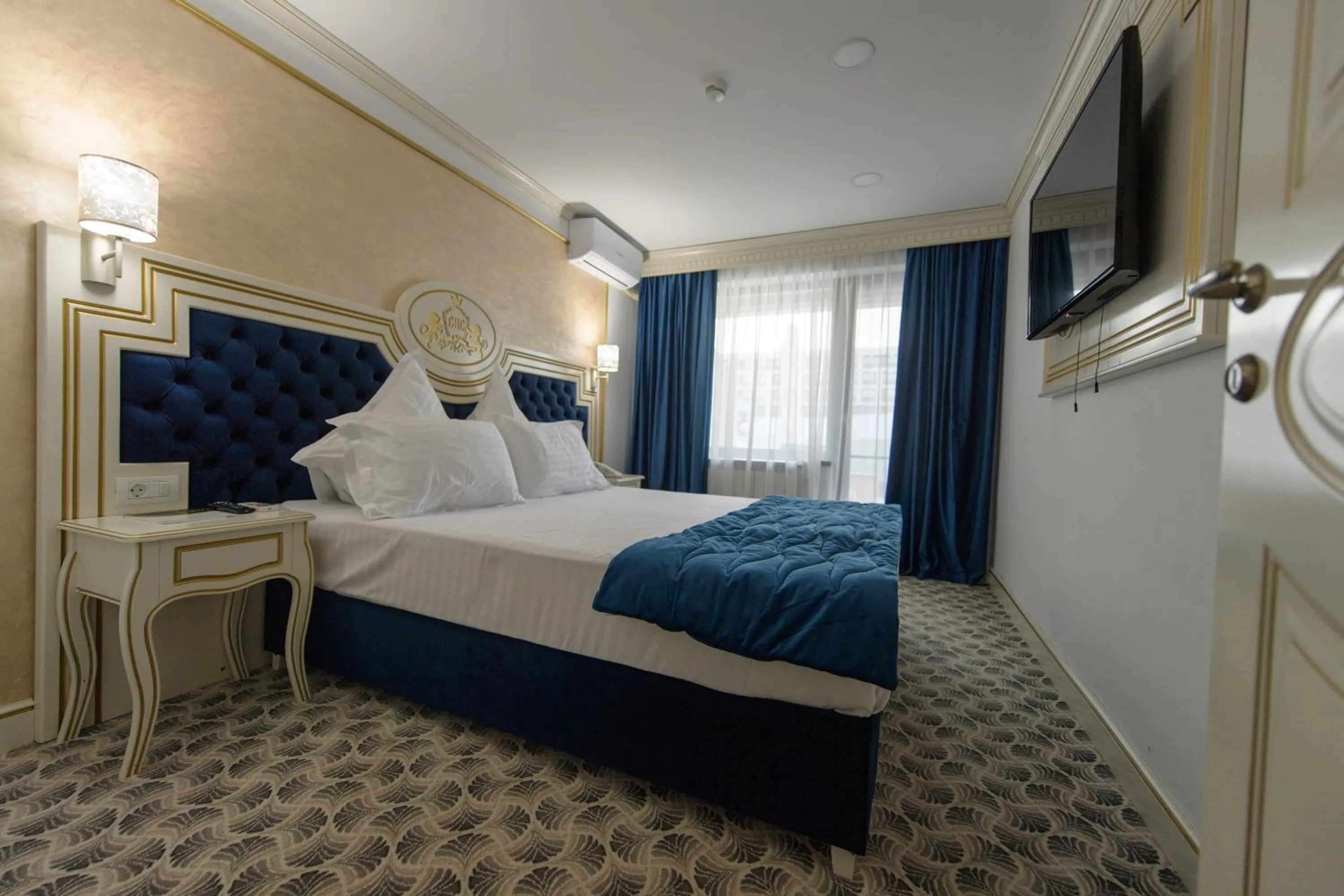 Bed in Grand Hotel Caraiman