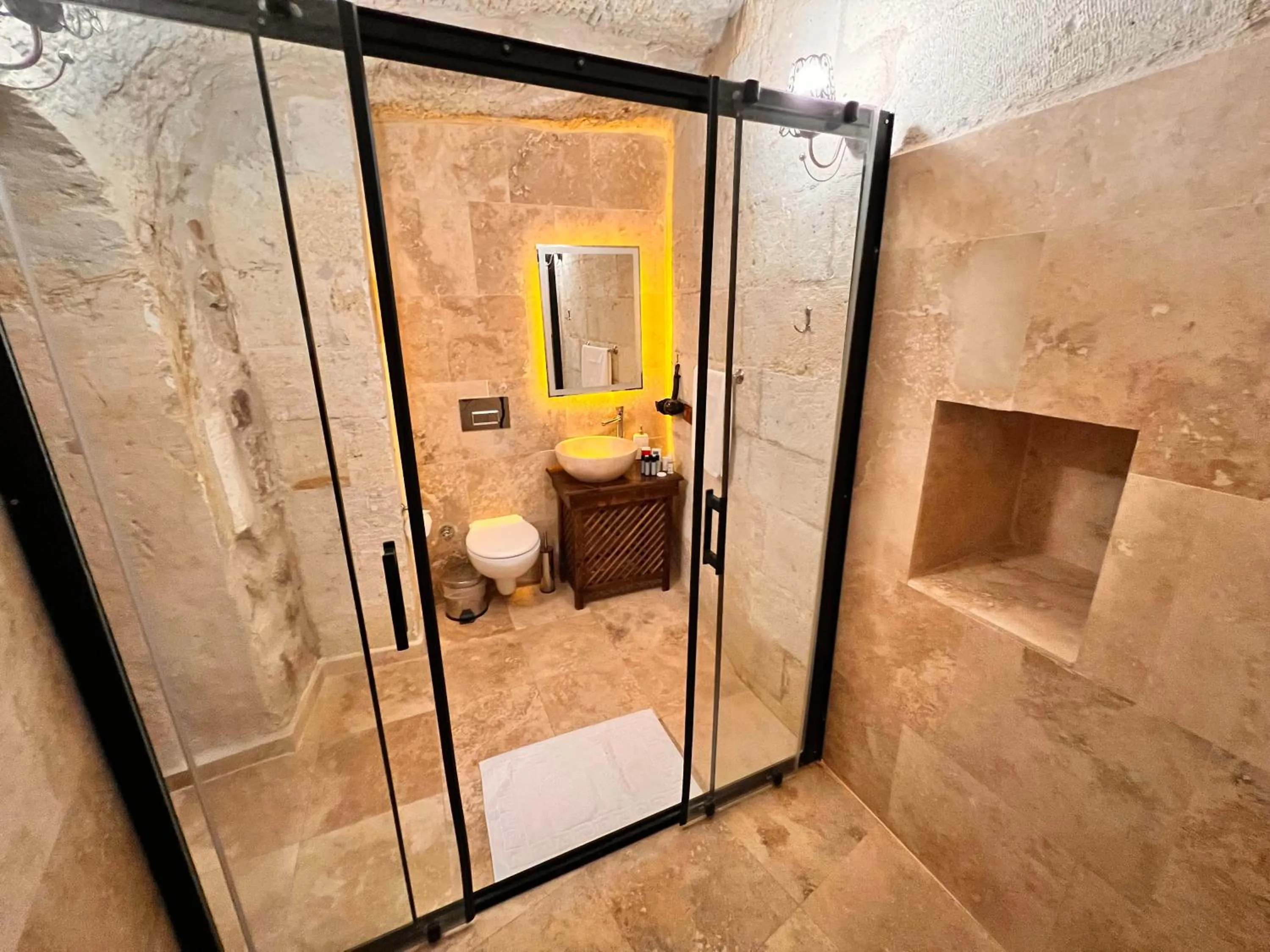 Shower in Shadow Cave House
