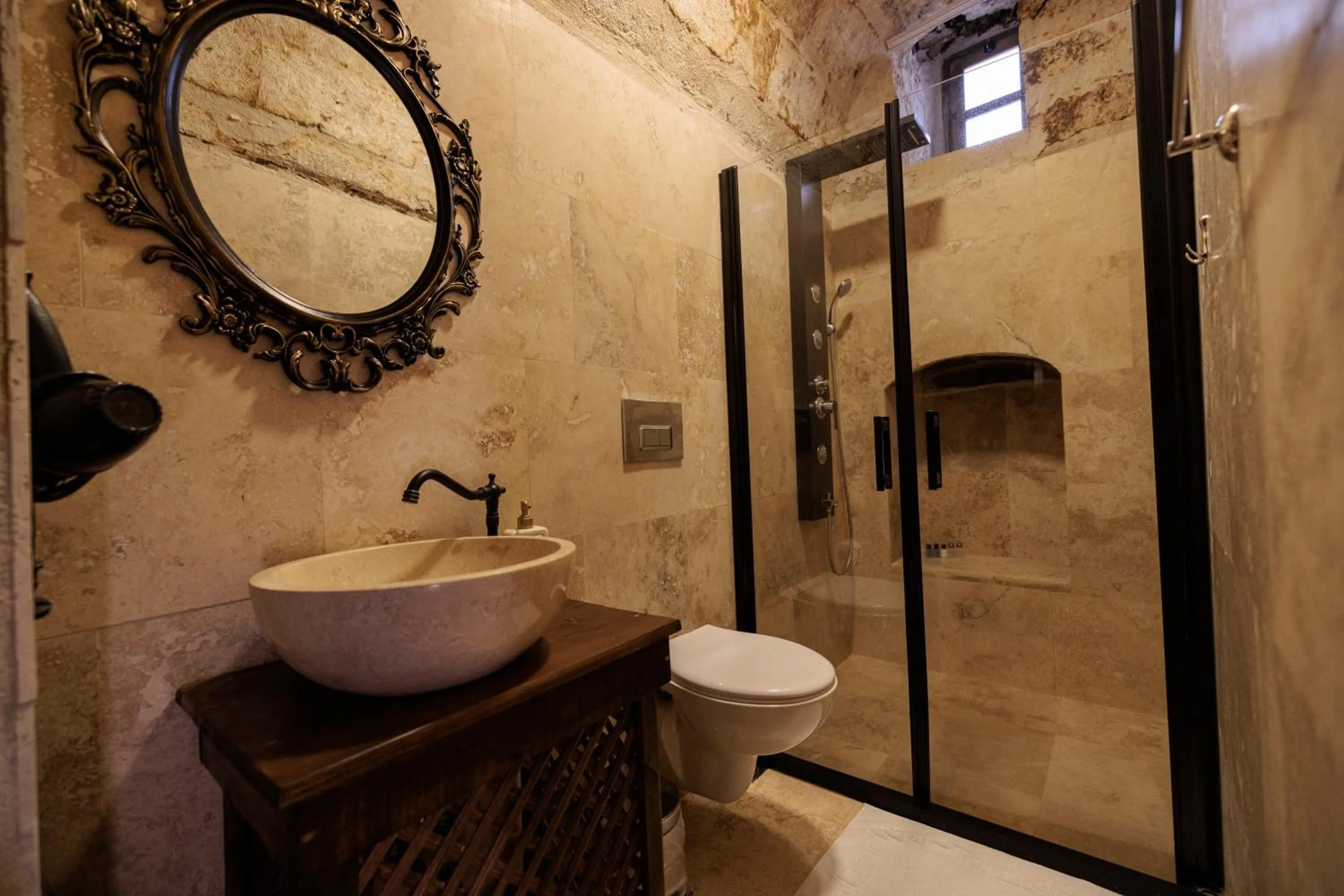 Shower in Shadow Cave House