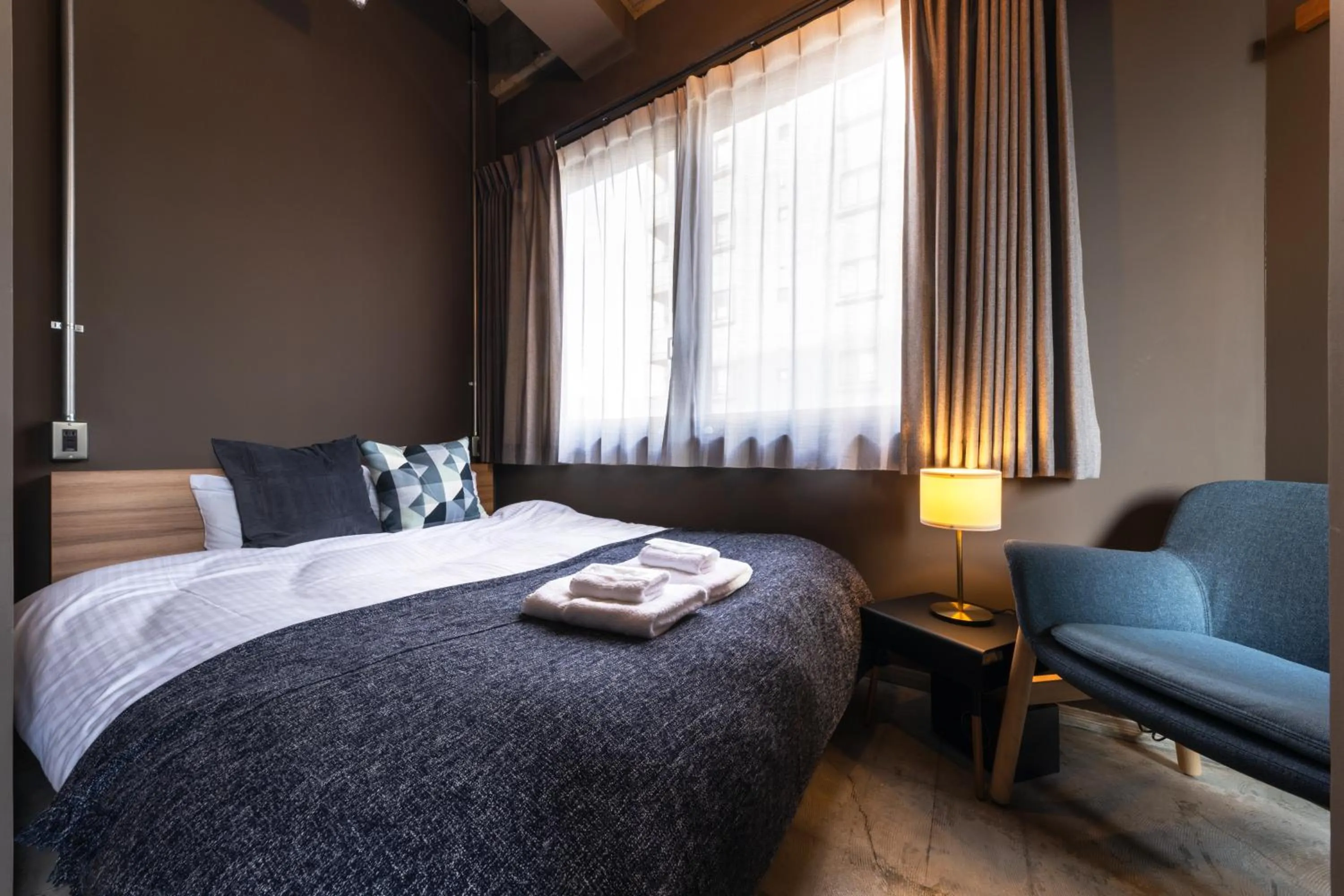 Photo of the whole room, Bed in UNPLAN Fukuoka