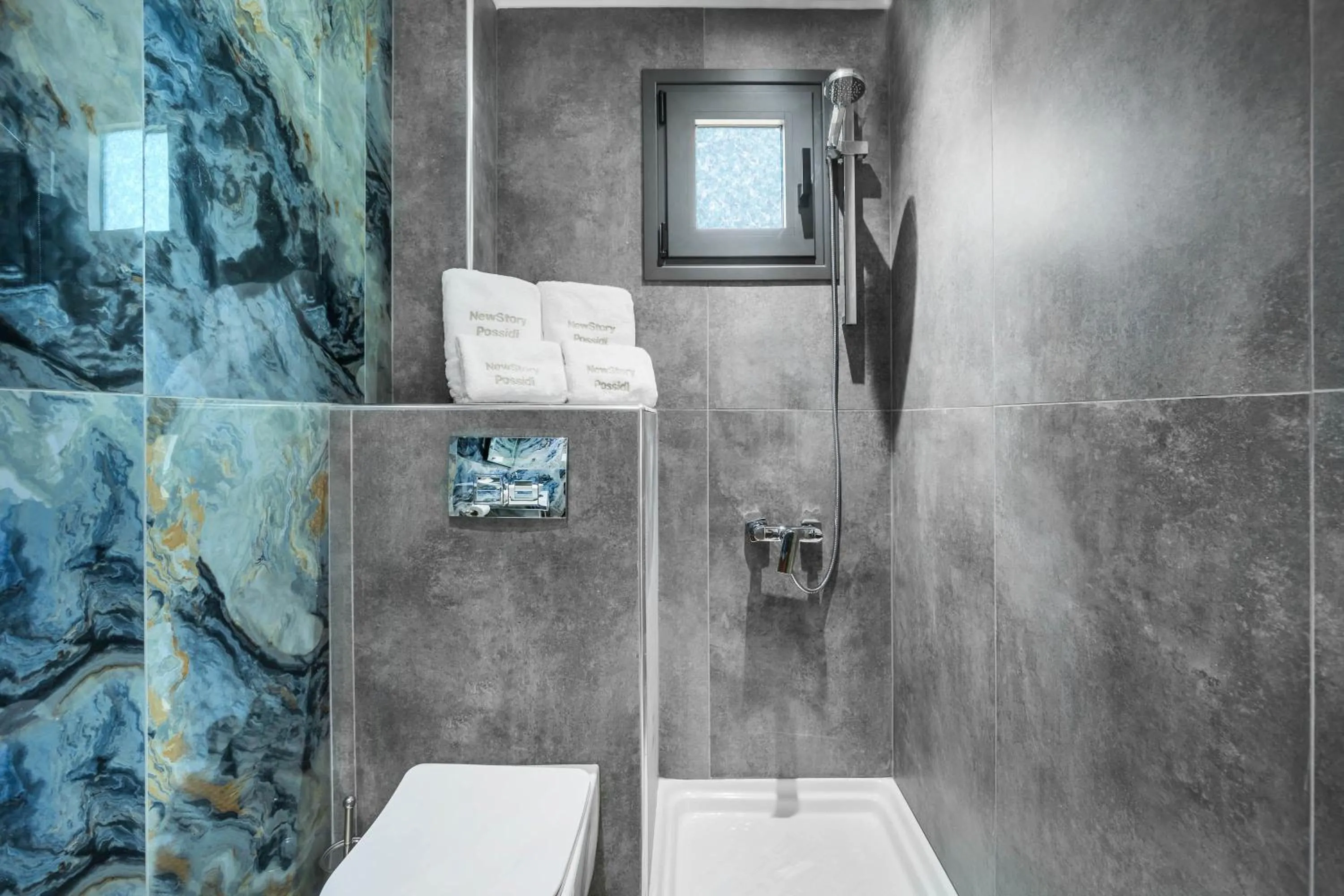 Shower in NewStory Suites Possidi