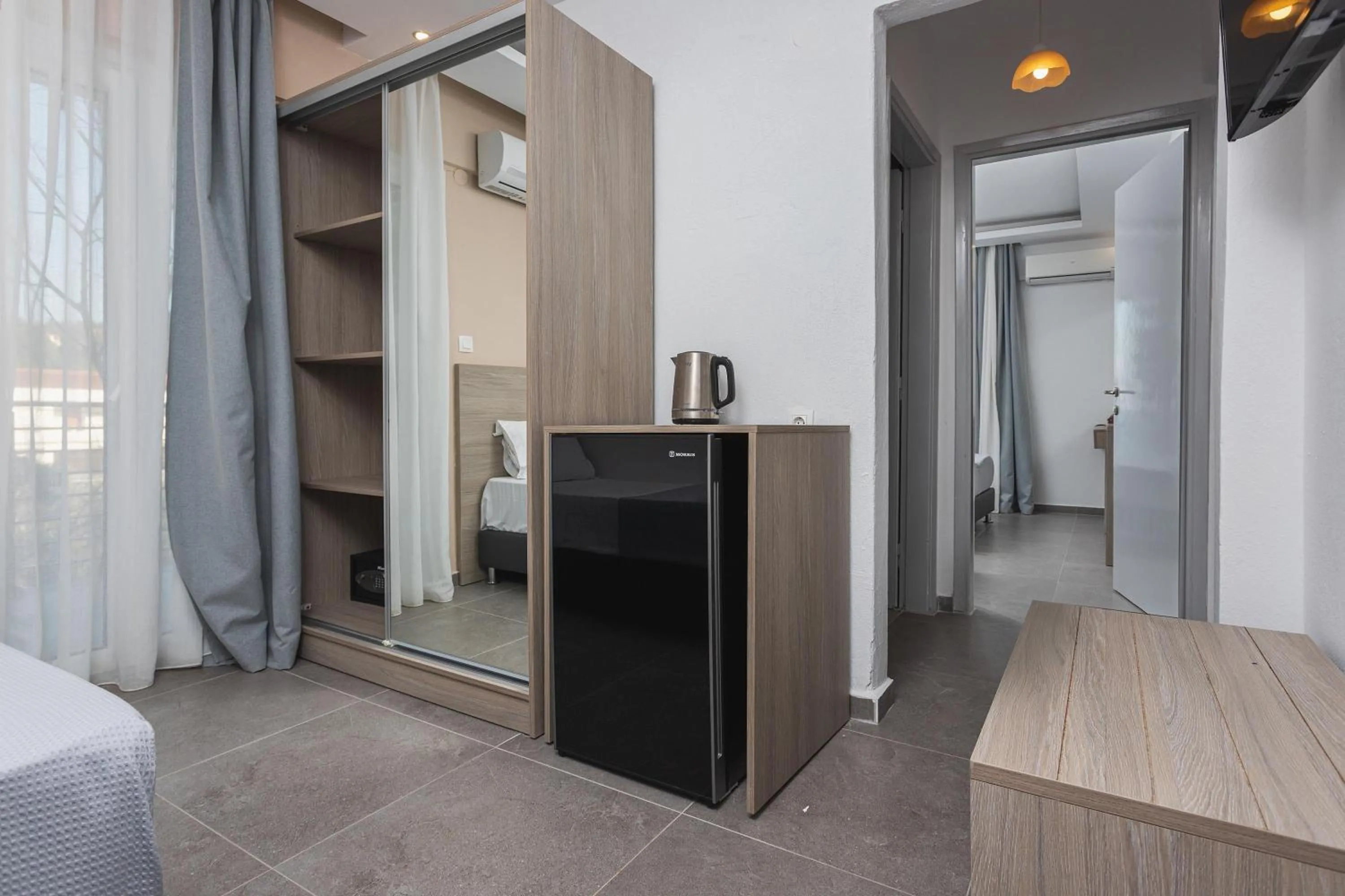 Bed in NewStory Suites Possidi