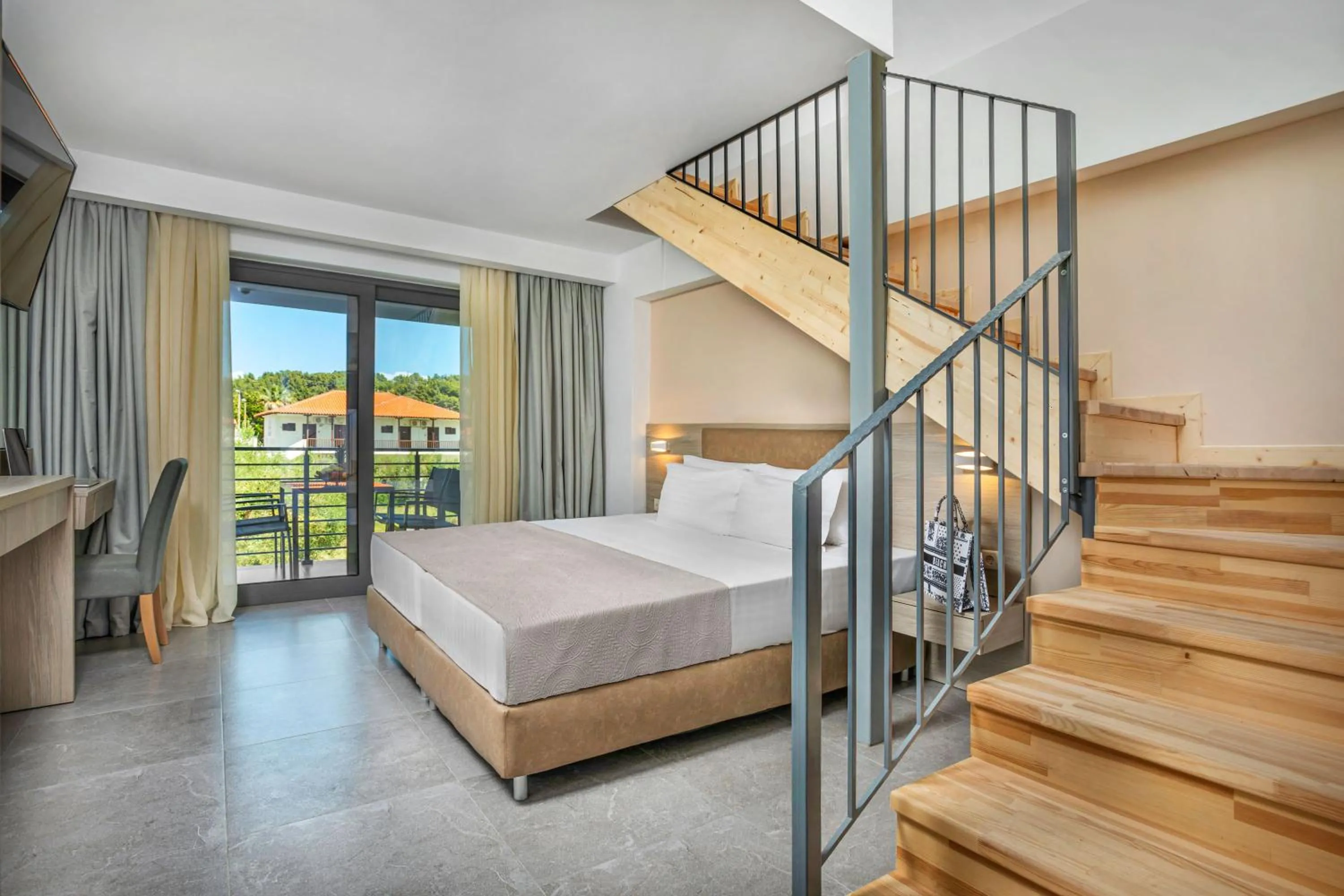 Bed in NewStory Suites Possidi