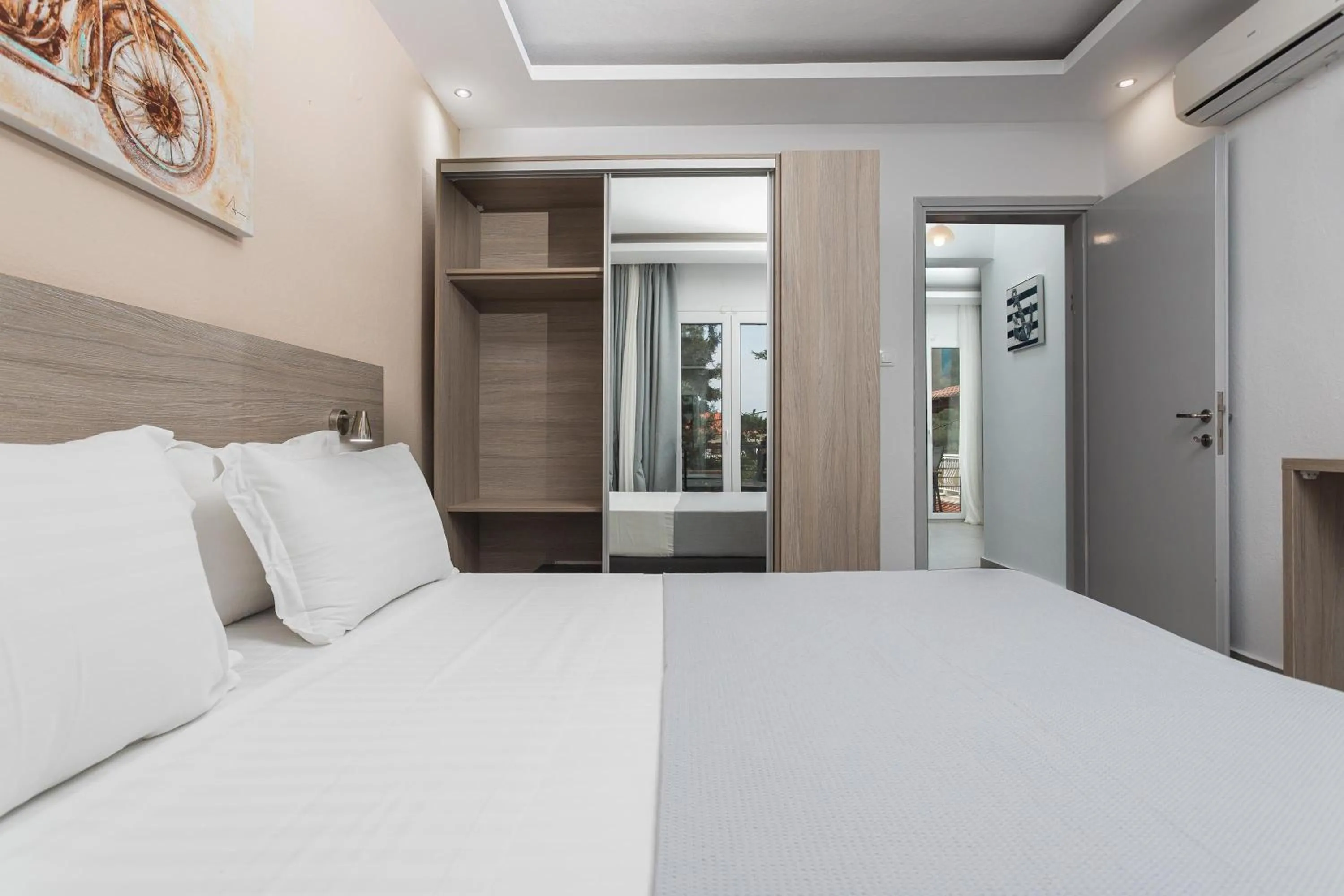 Bedroom, Bed in NewStory Suites Possidi