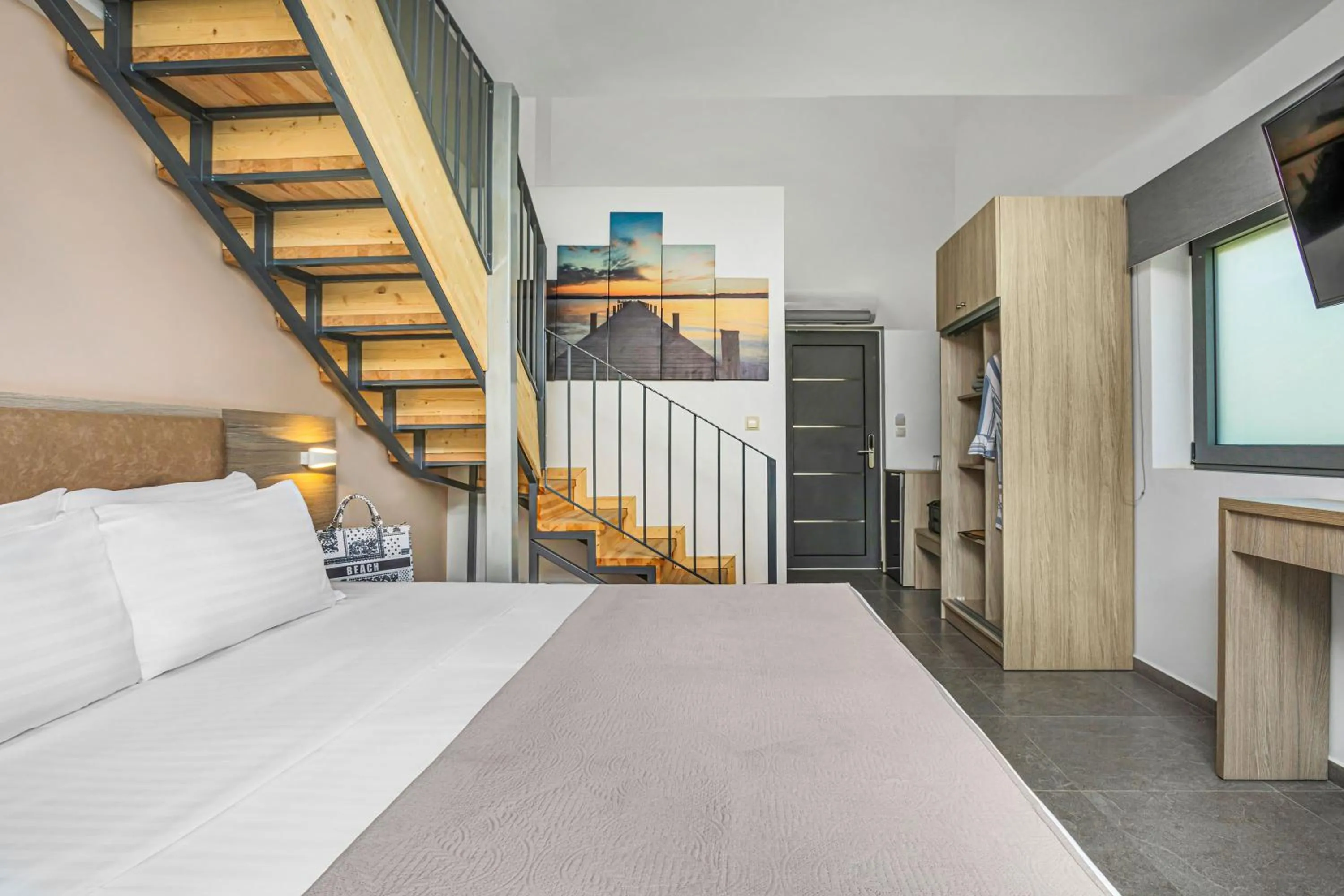 Bed in NewStory Suites Possidi