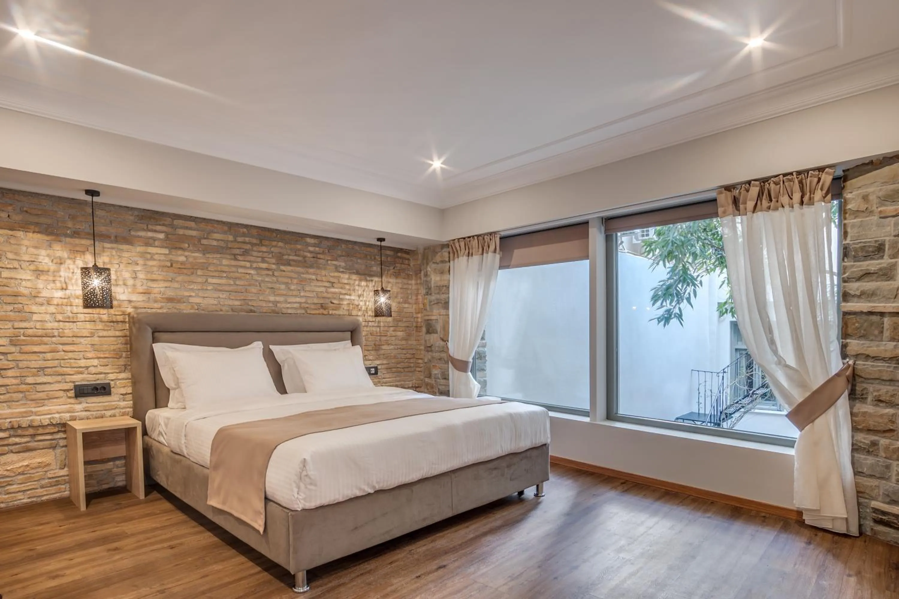 Bed in Philia Boutique Hotel