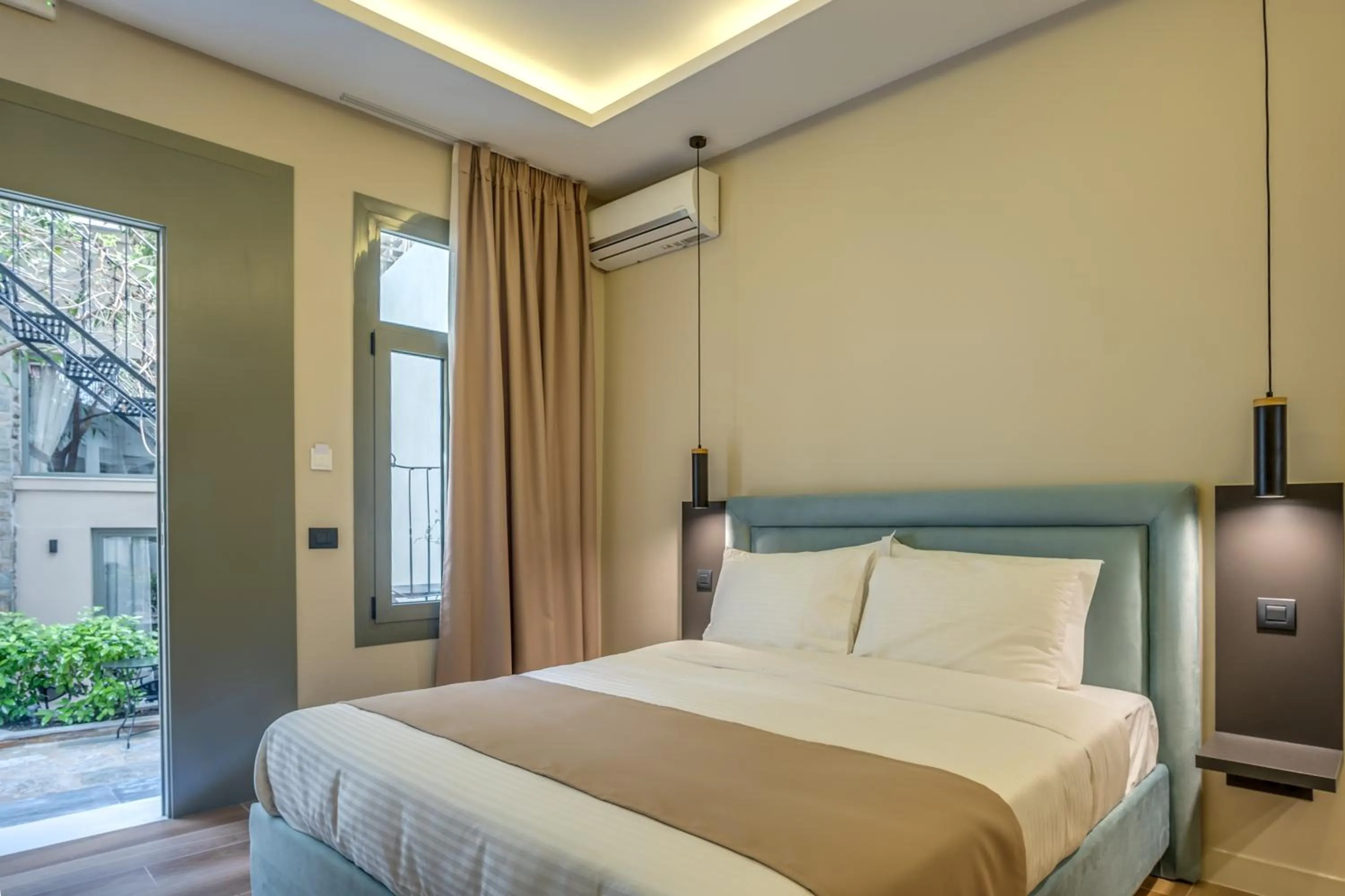 Bed in Philia Boutique Hotel