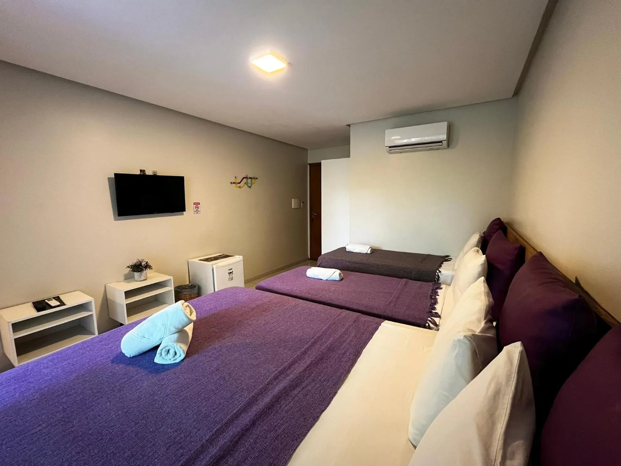 Bed in Pousada Unaí