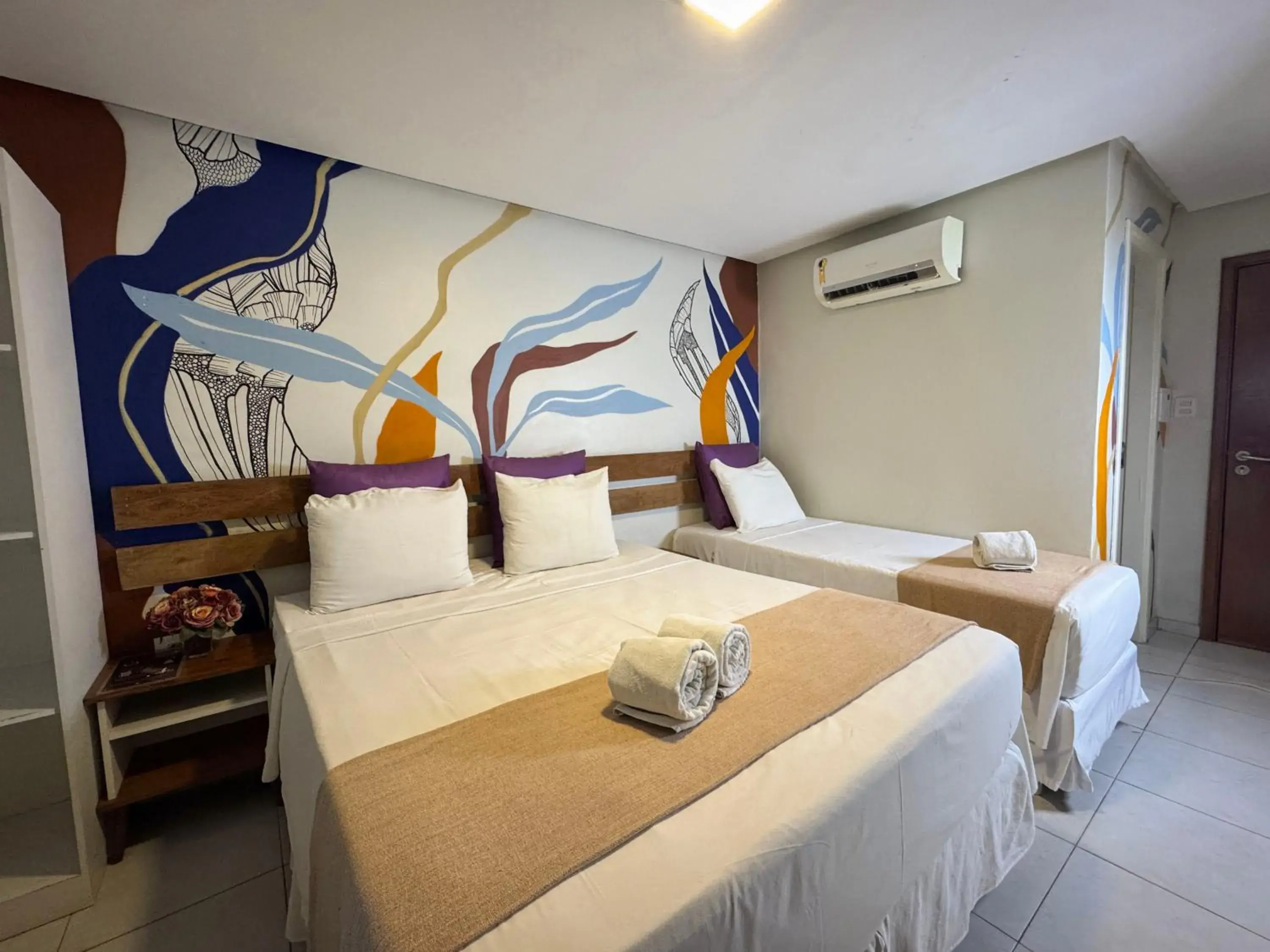 Triple Room with Pool View in Pousada Unaí Triple Room with Pool View in Pousada Unaí