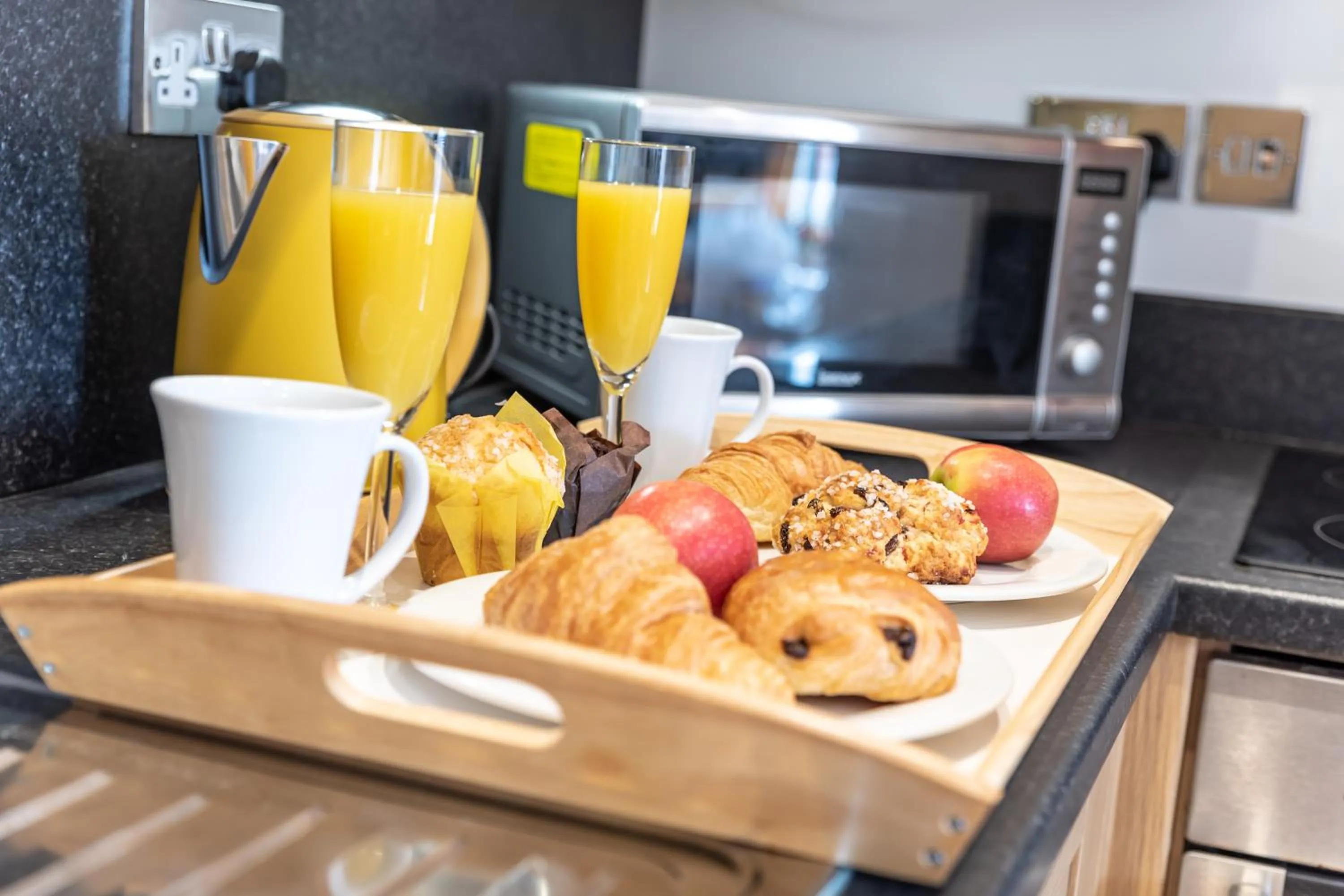 Kitchen or kitchenette in The Old Library - Modern Apartment near the Train Station and Racecourse