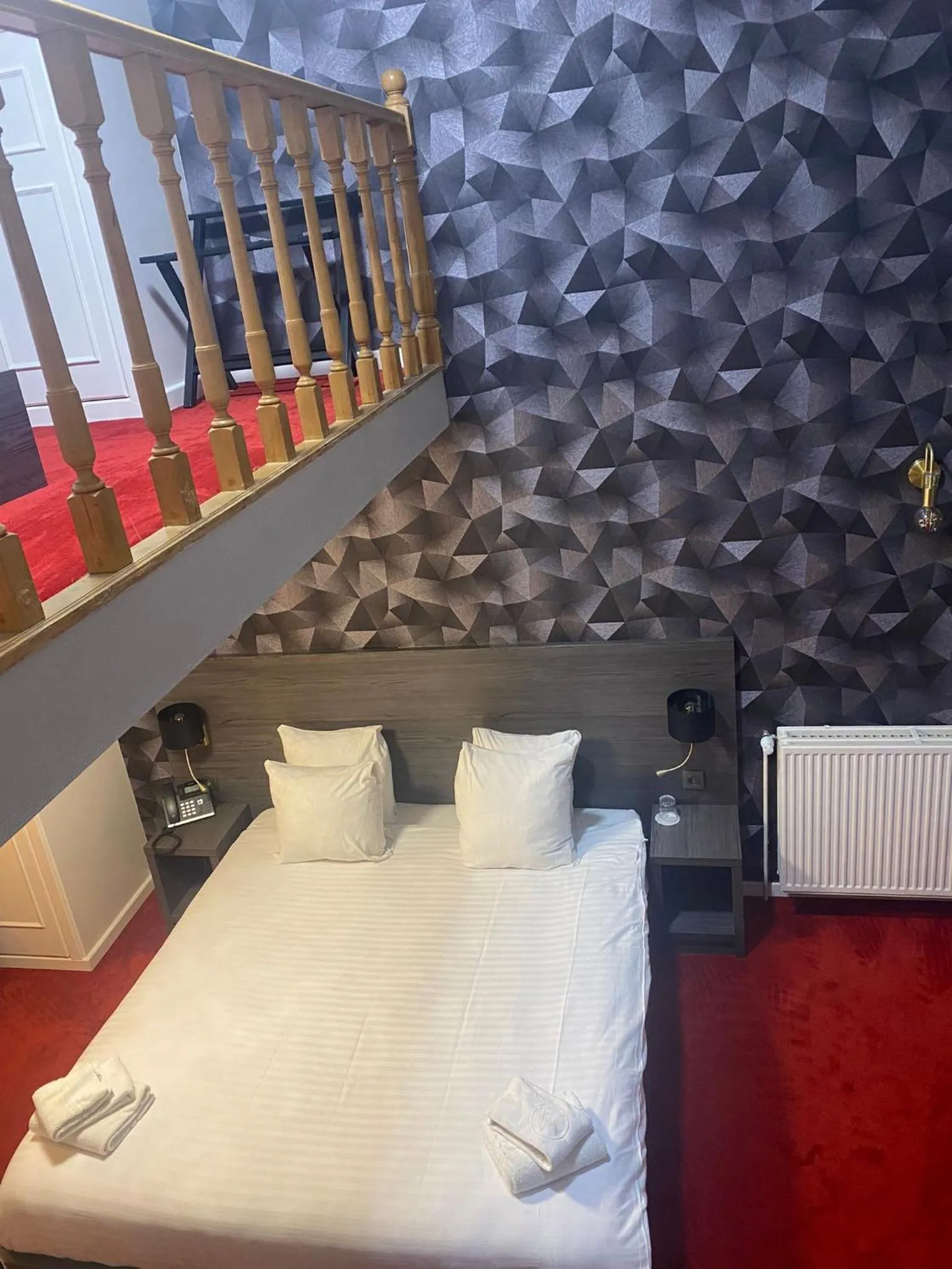 Bed in La Bourse Hotel