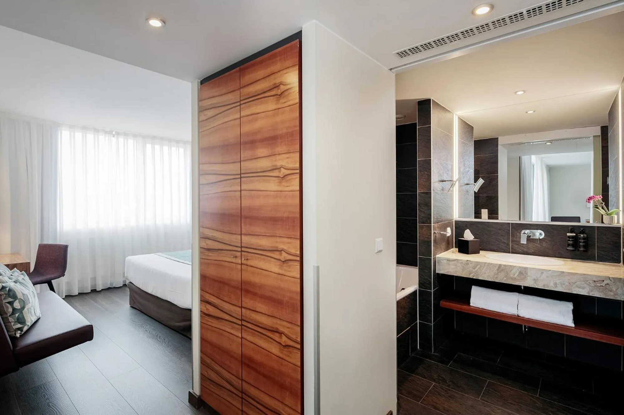 Bed in Eurostars Embassy