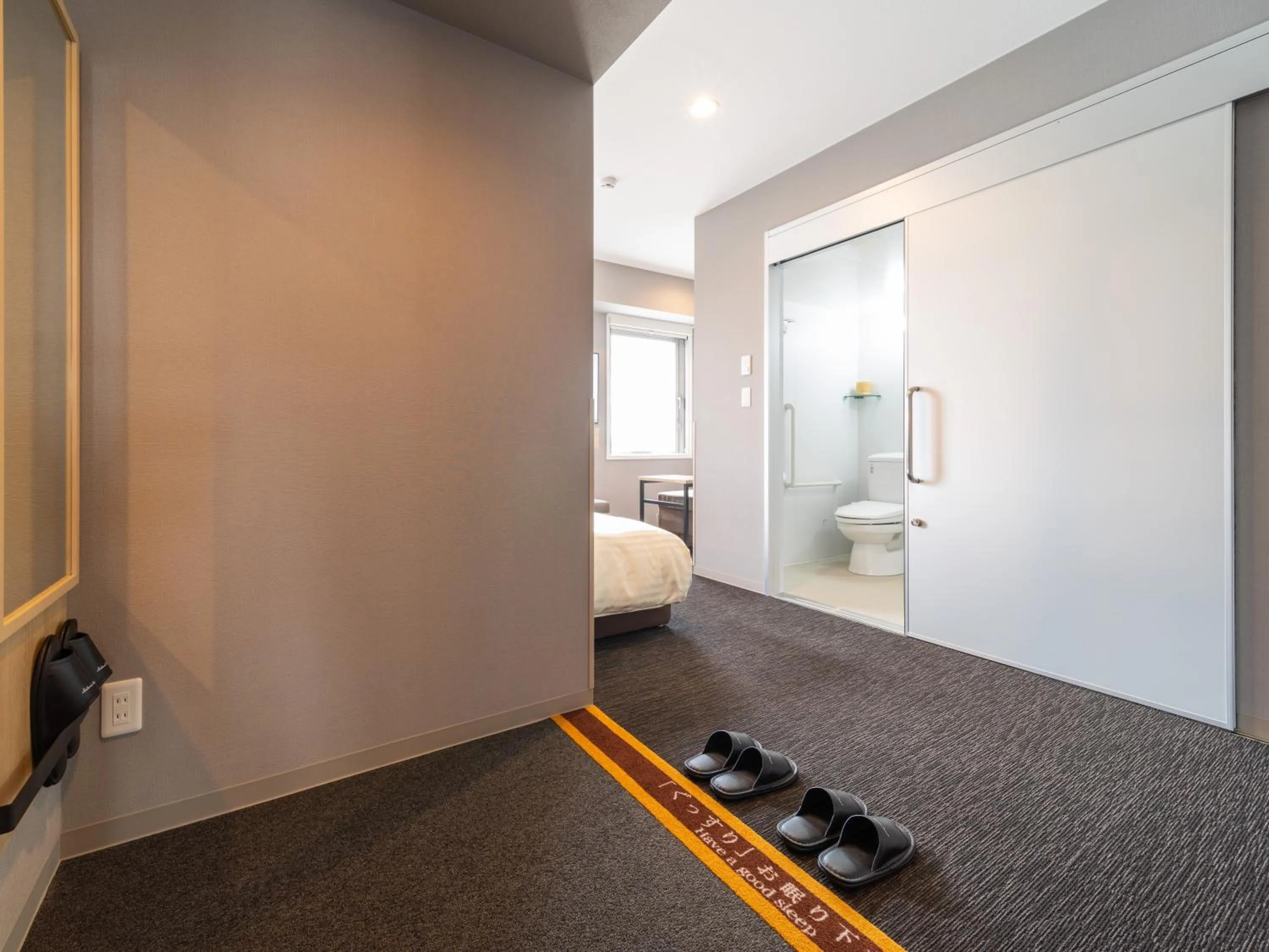 Photo of the whole room, Bed in Super Hotel Nagoya Shinkansenguchi