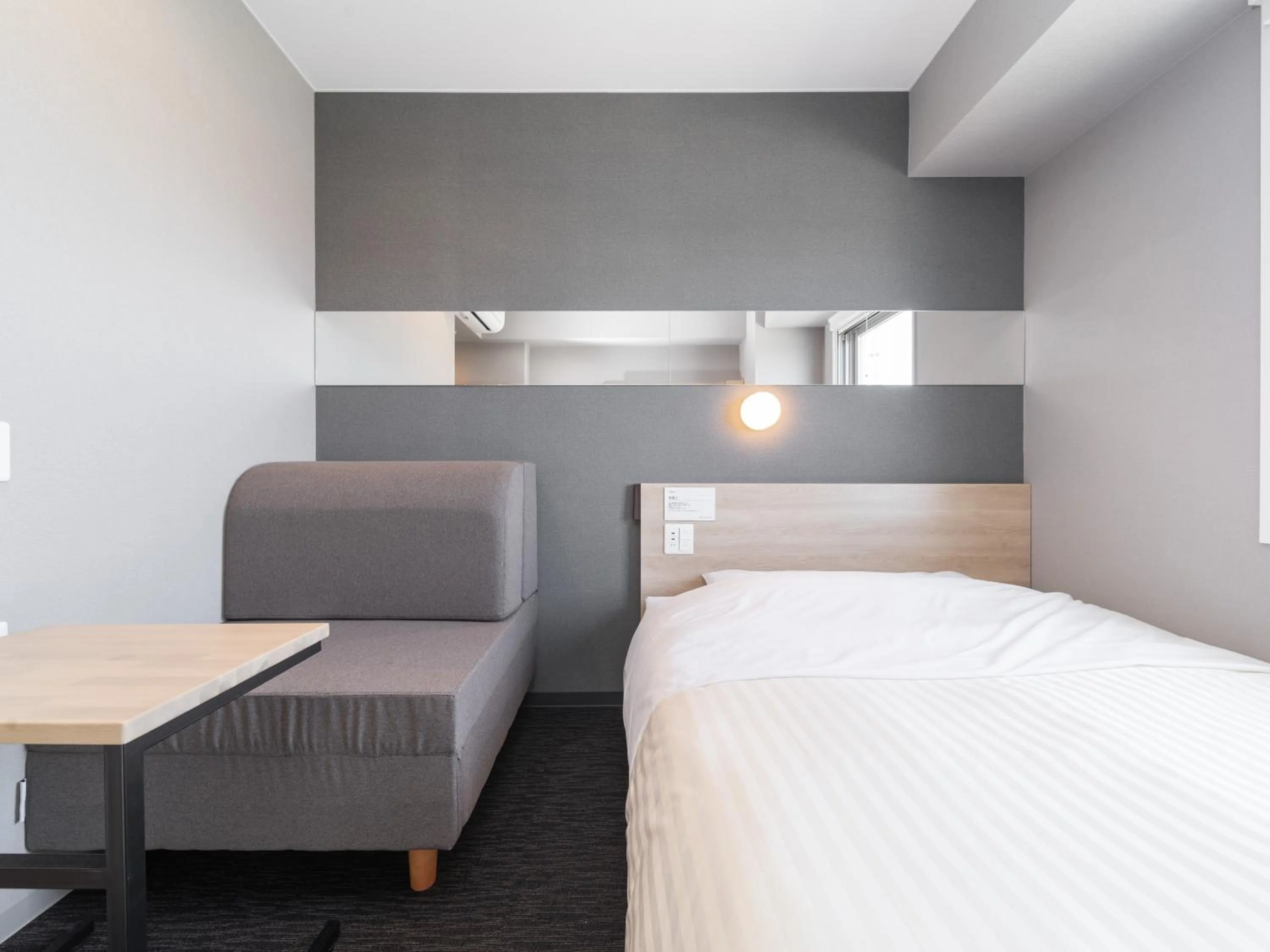 Bed in Super Hotel Nagoya Shinkansenguchi