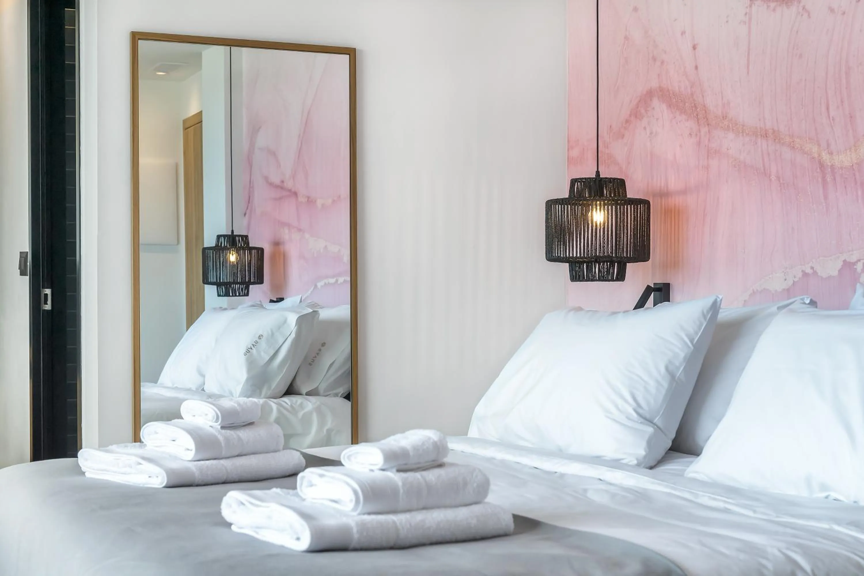 Bed in SAVUS Boutique Hotel