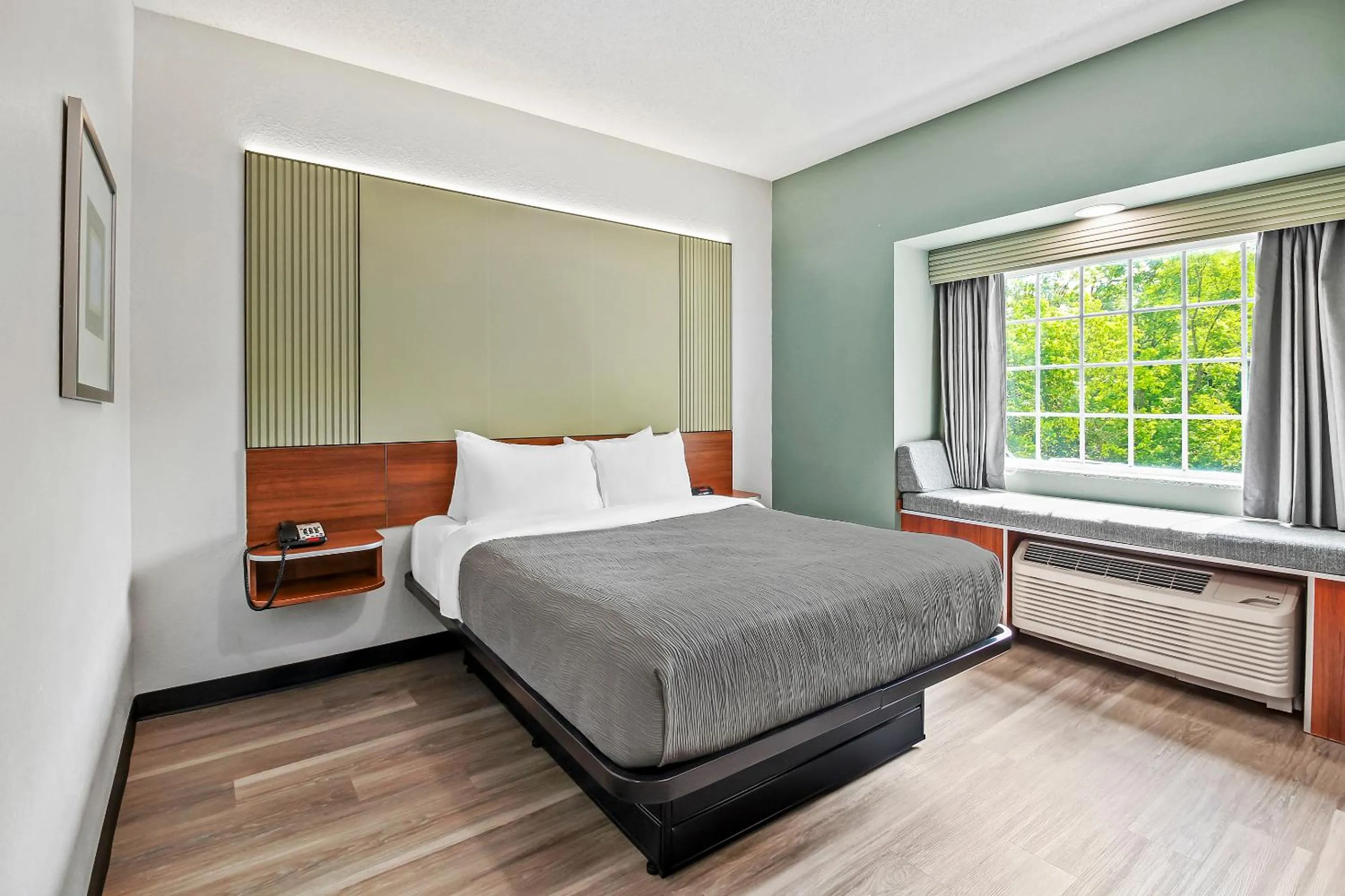 Bed in Quality Inn & Suites