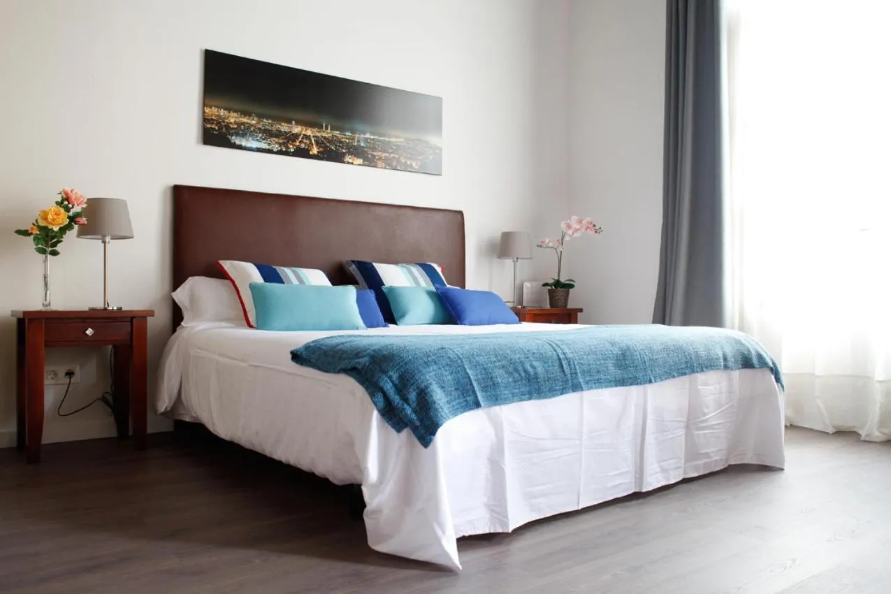 Bed in Colom Apartments