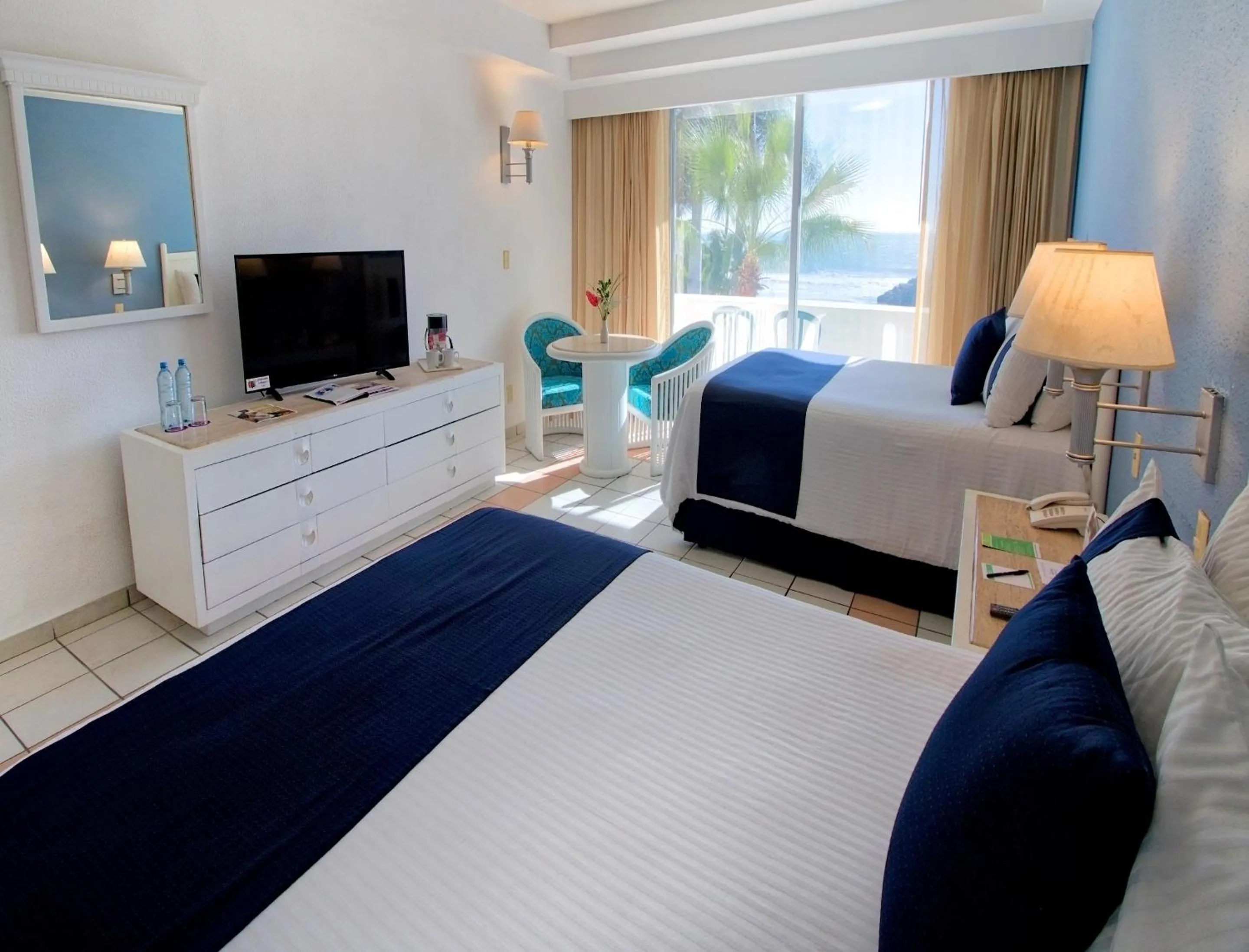 Bed, Seating Area in Mision Mazatlan