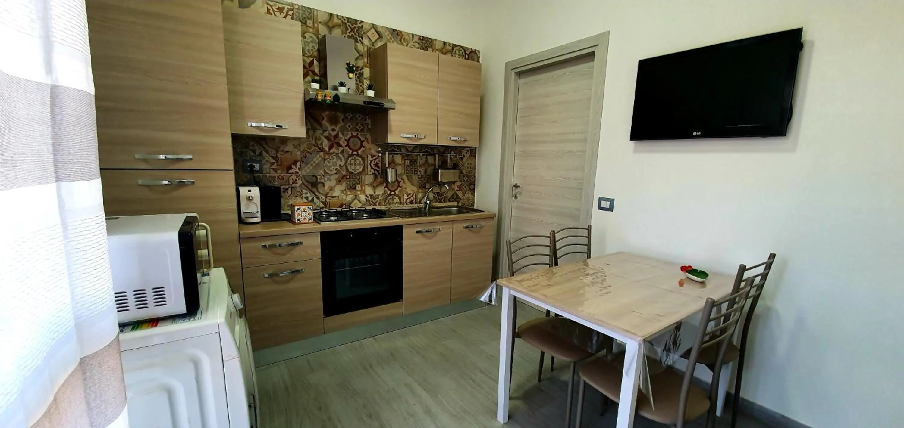 Kitchen or kitchenette in Casa Gio - Appartamenti Vacanze