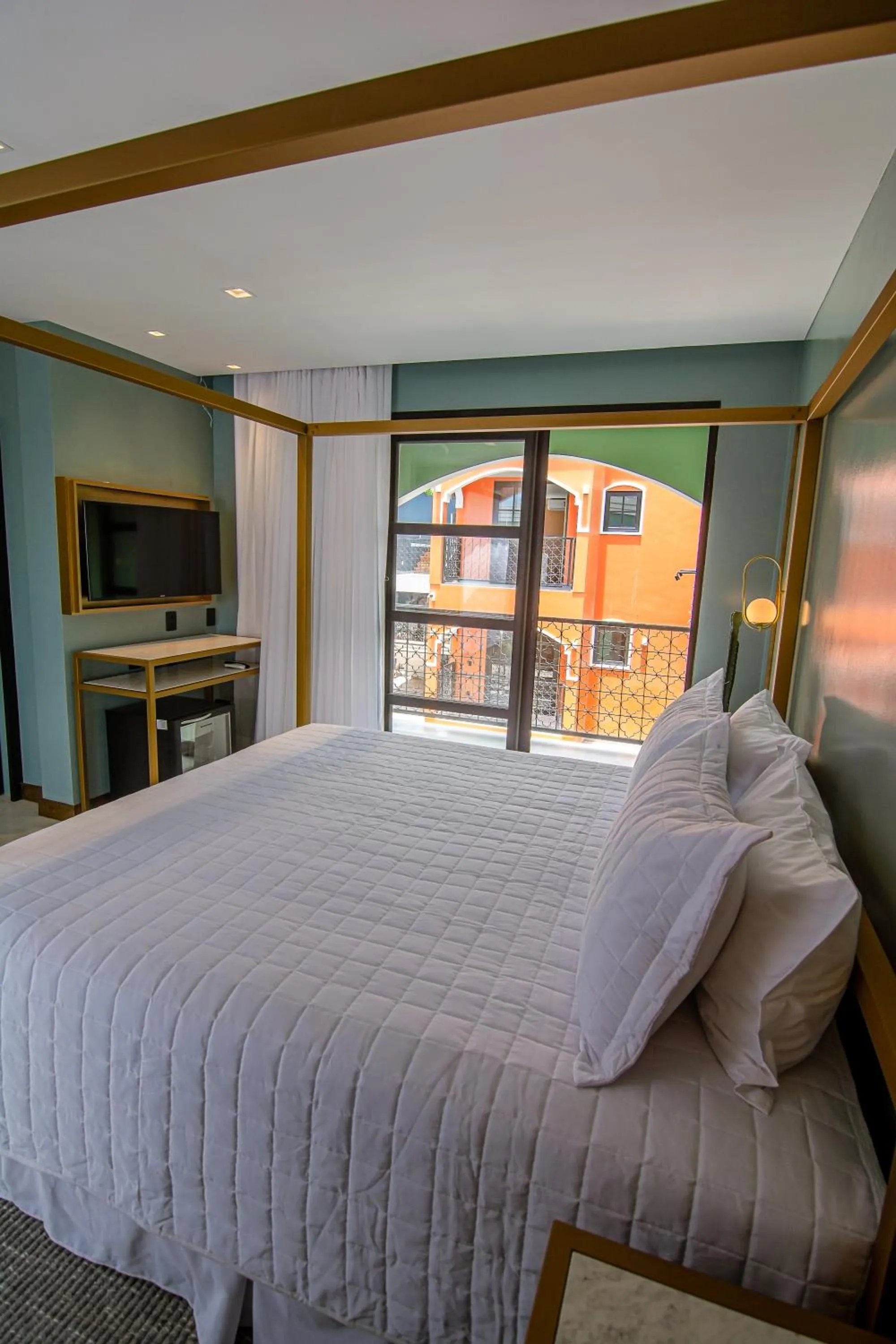 Bed in Exótica Boutique Hotel