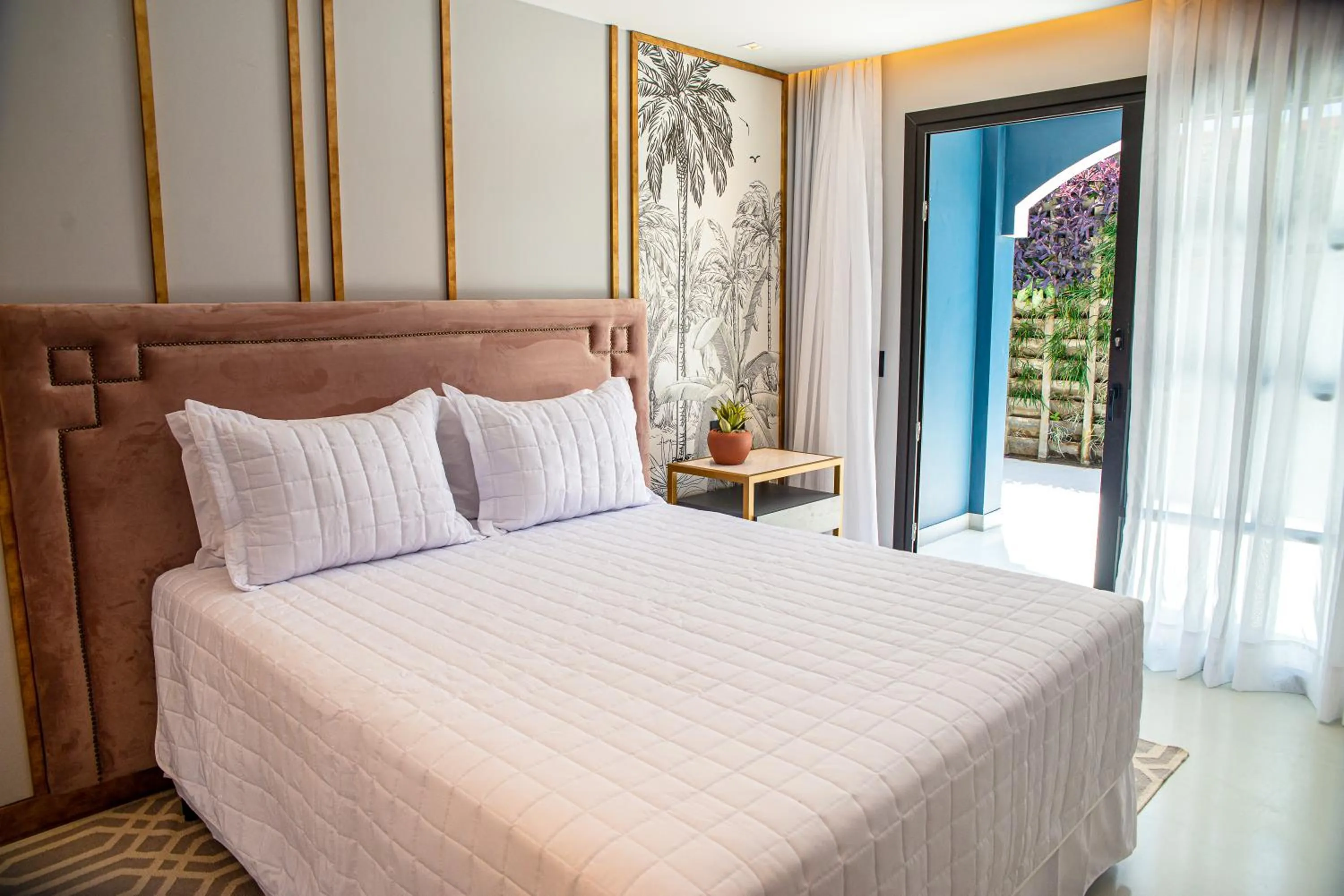 Bed in Exótica Boutique Hotel