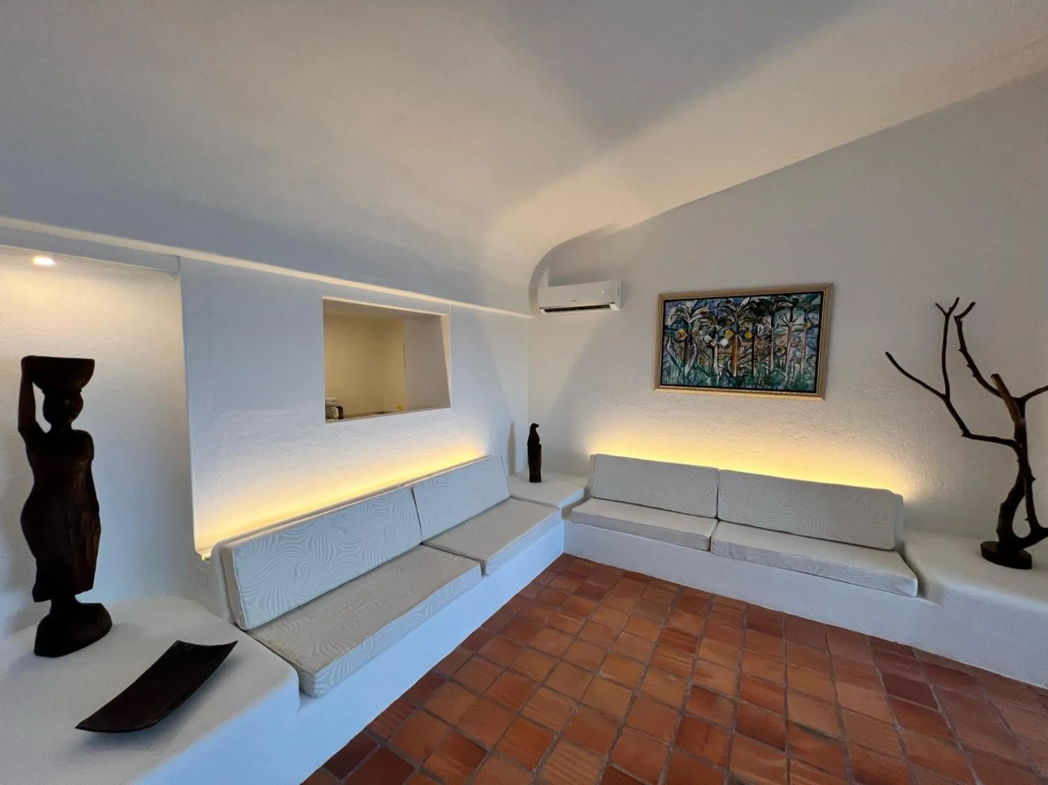 Seating area, Bed in OceanBlue Resort