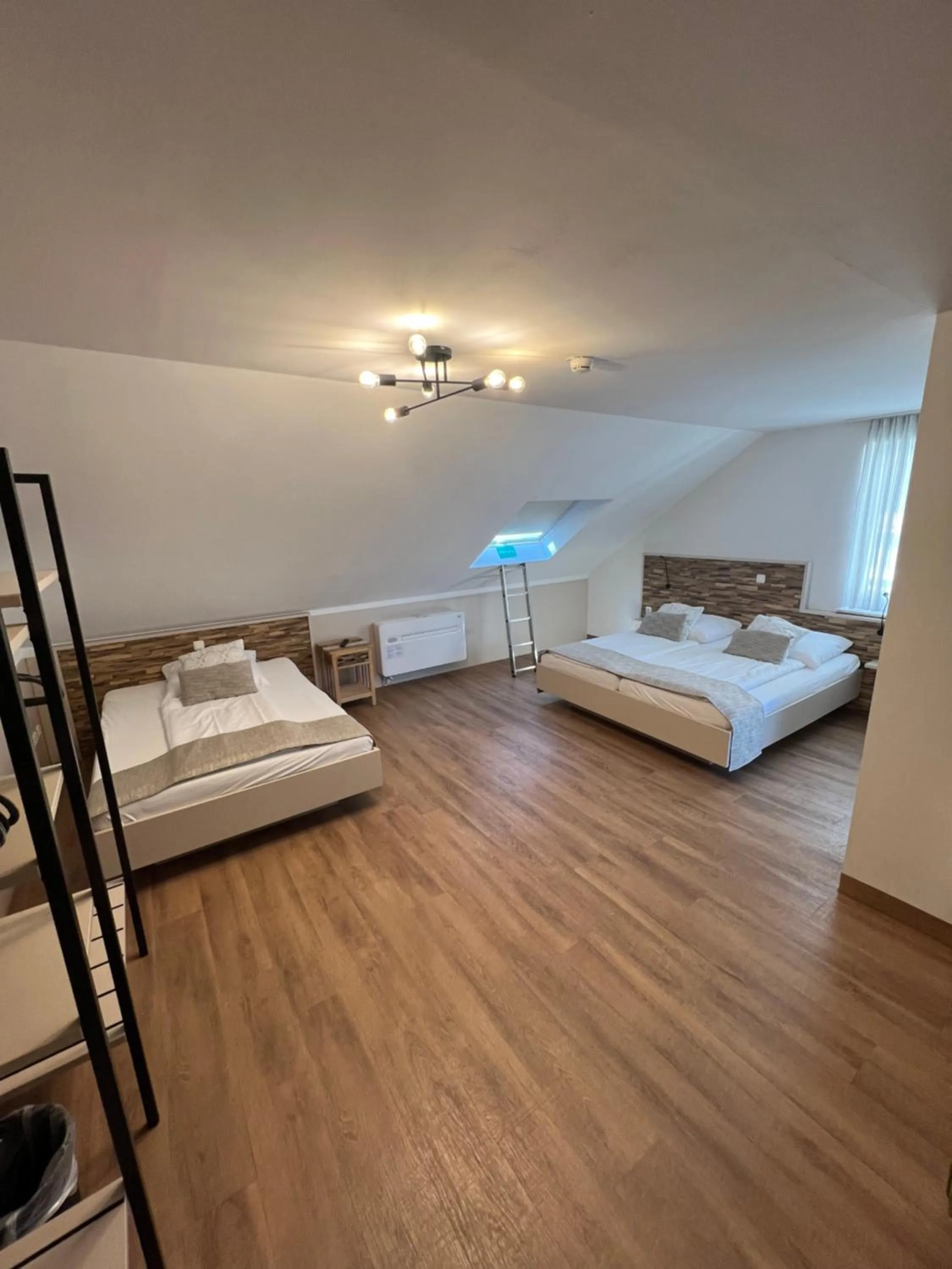 Photo of the whole room, Bed in Am Blumenhaus