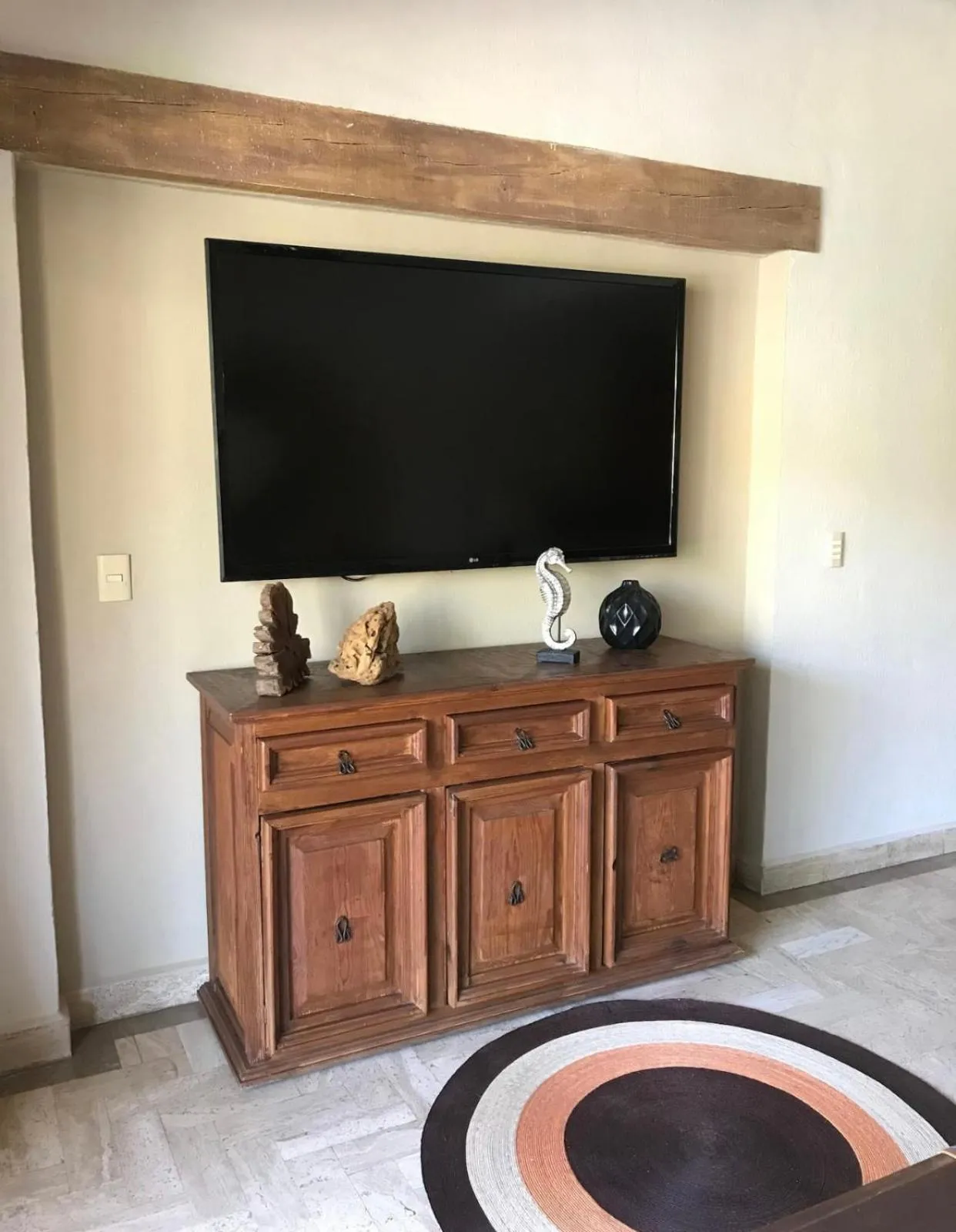 Communal lounge/ TV room in Velas Vallarta Condo