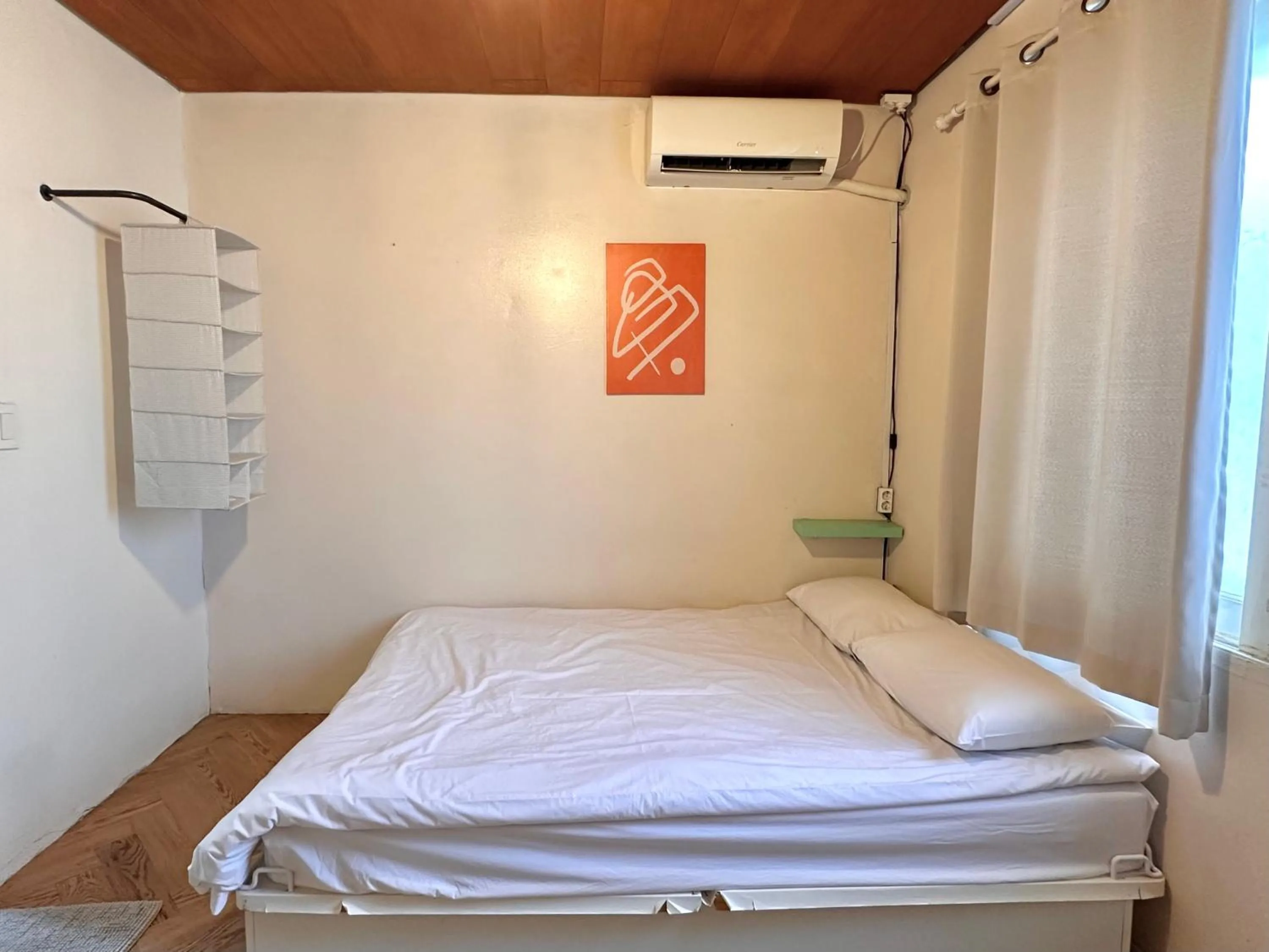 Bed in SISnBRO Guesthouse