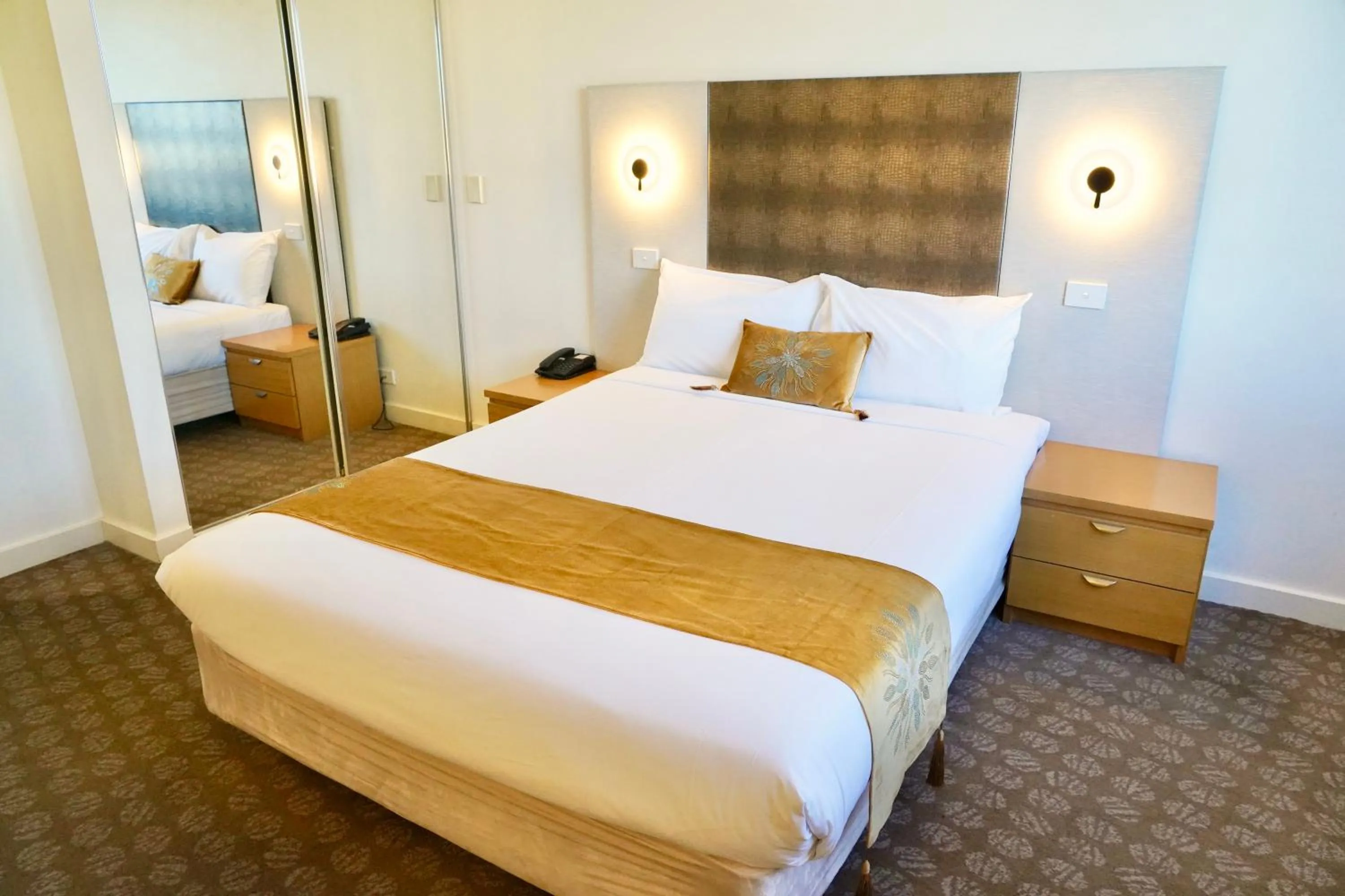 Bed in Golden Pebble Hotel