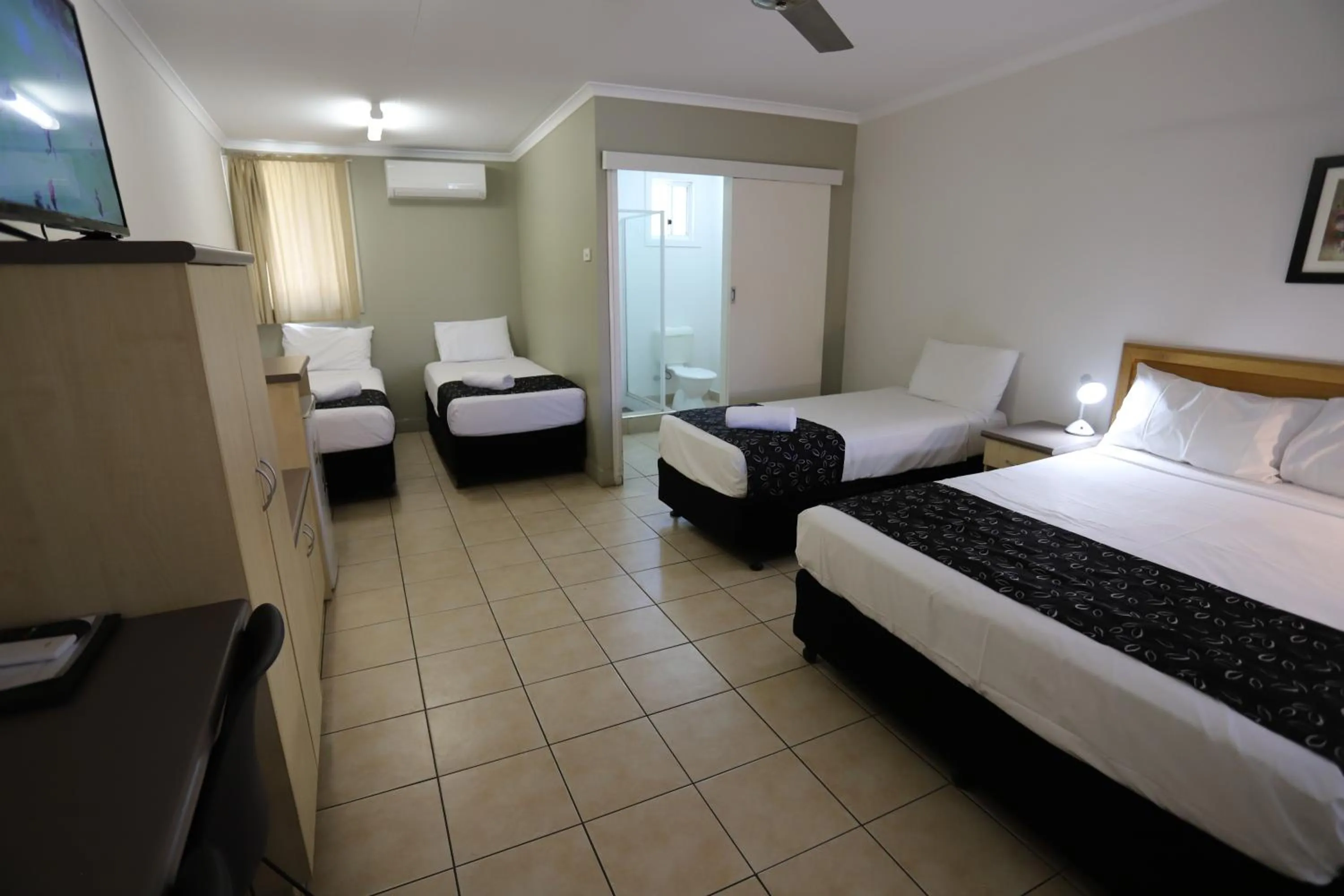 Bed in Tropic Coast Motel