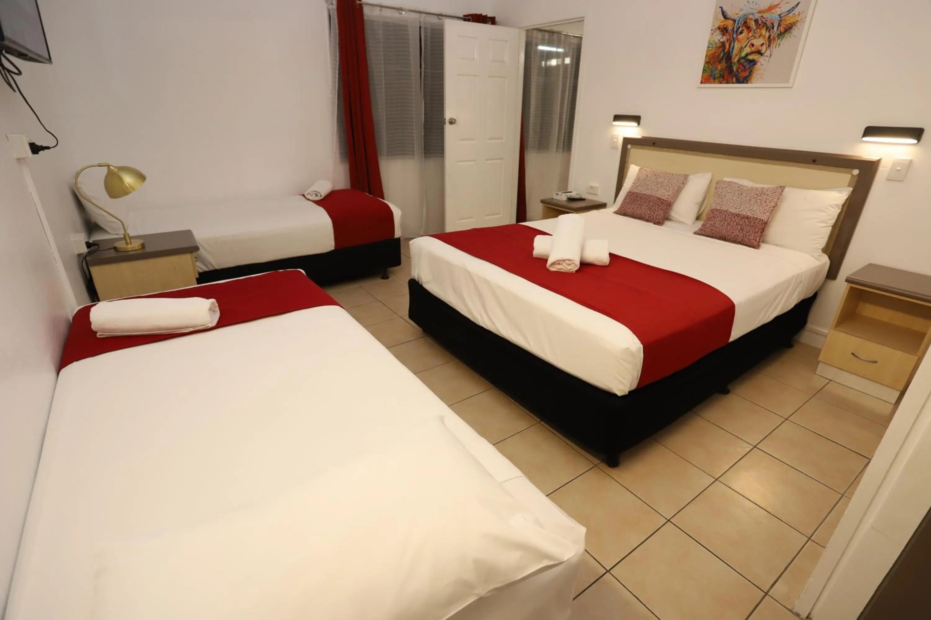 Bed in Tropic Coast Motel