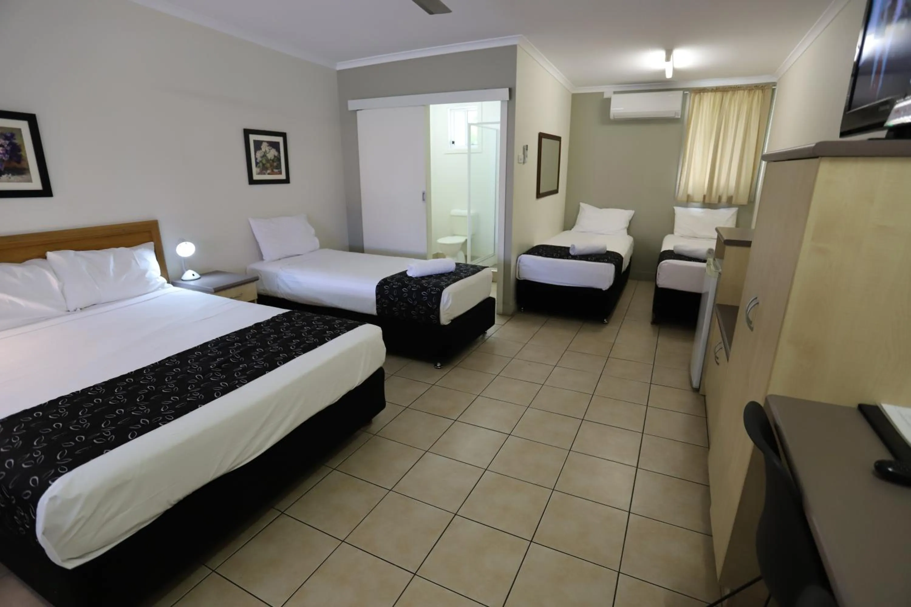 Bed in Tropic Coast Motel