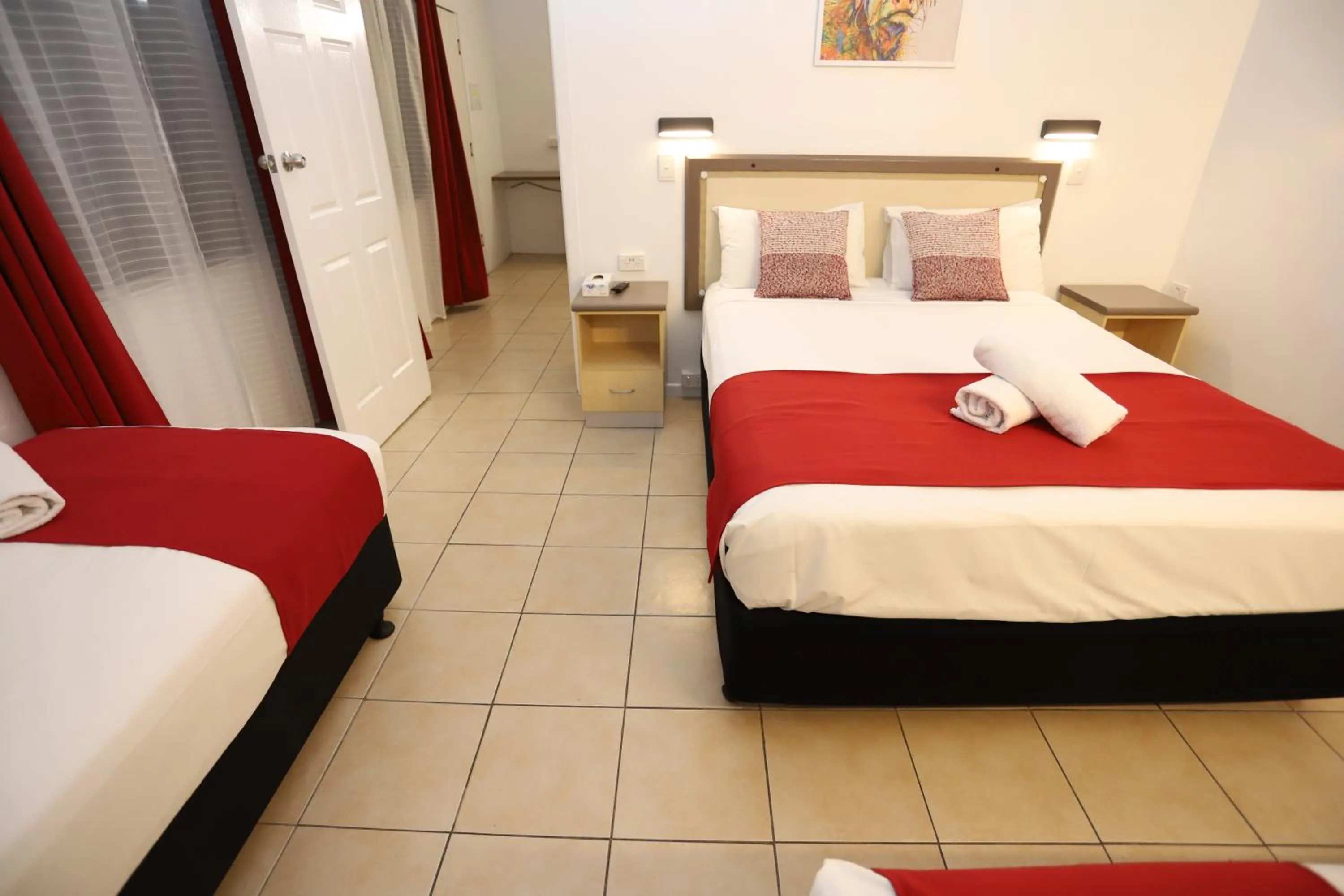 Bed in Tropic Coast Motel