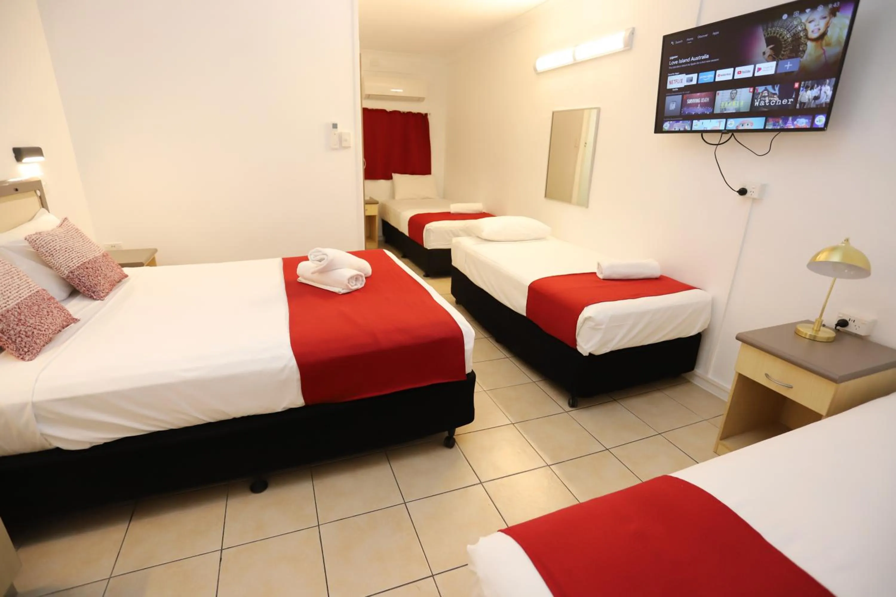 Bed in Tropic Coast Motel