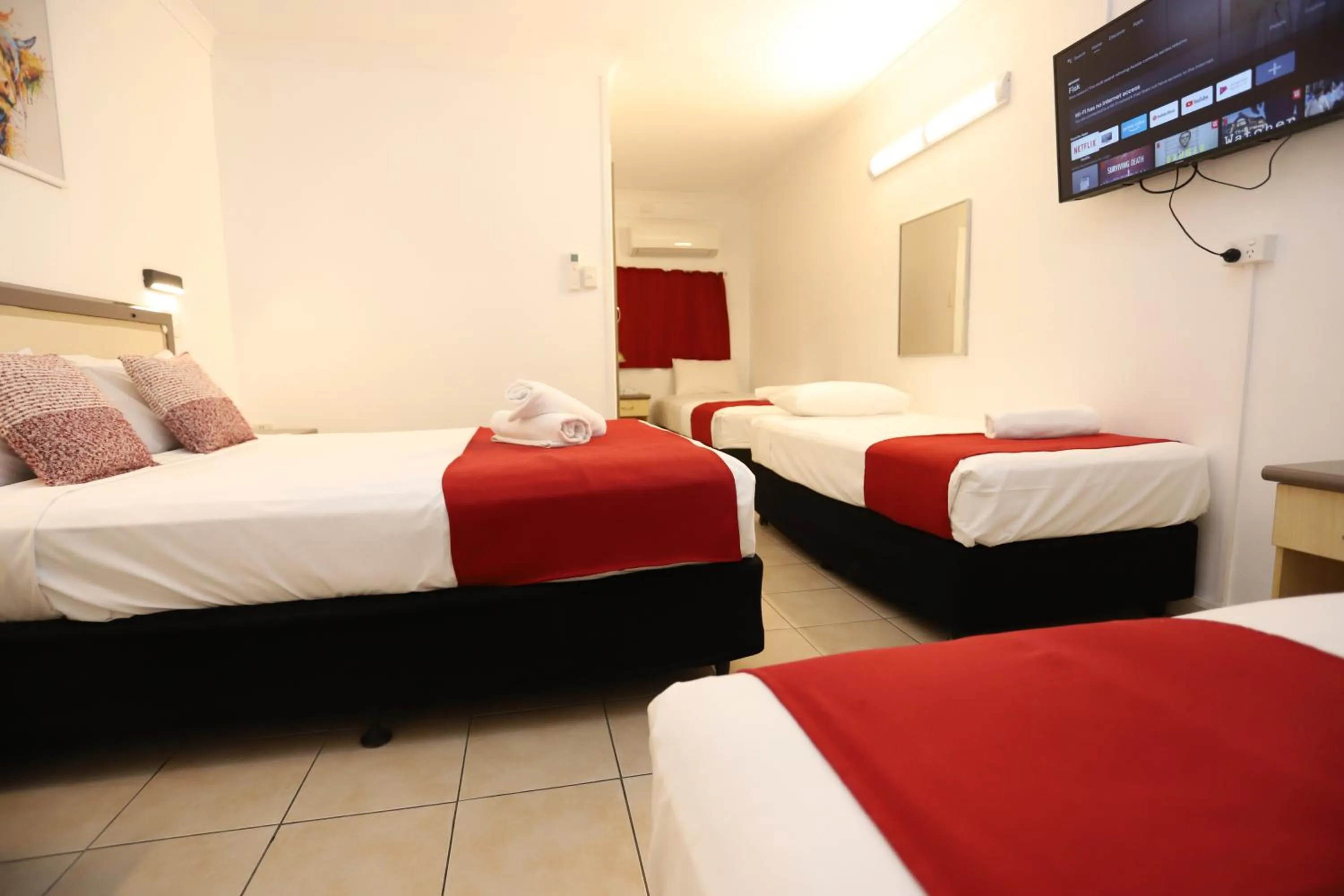 Bed in Tropic Coast Motel