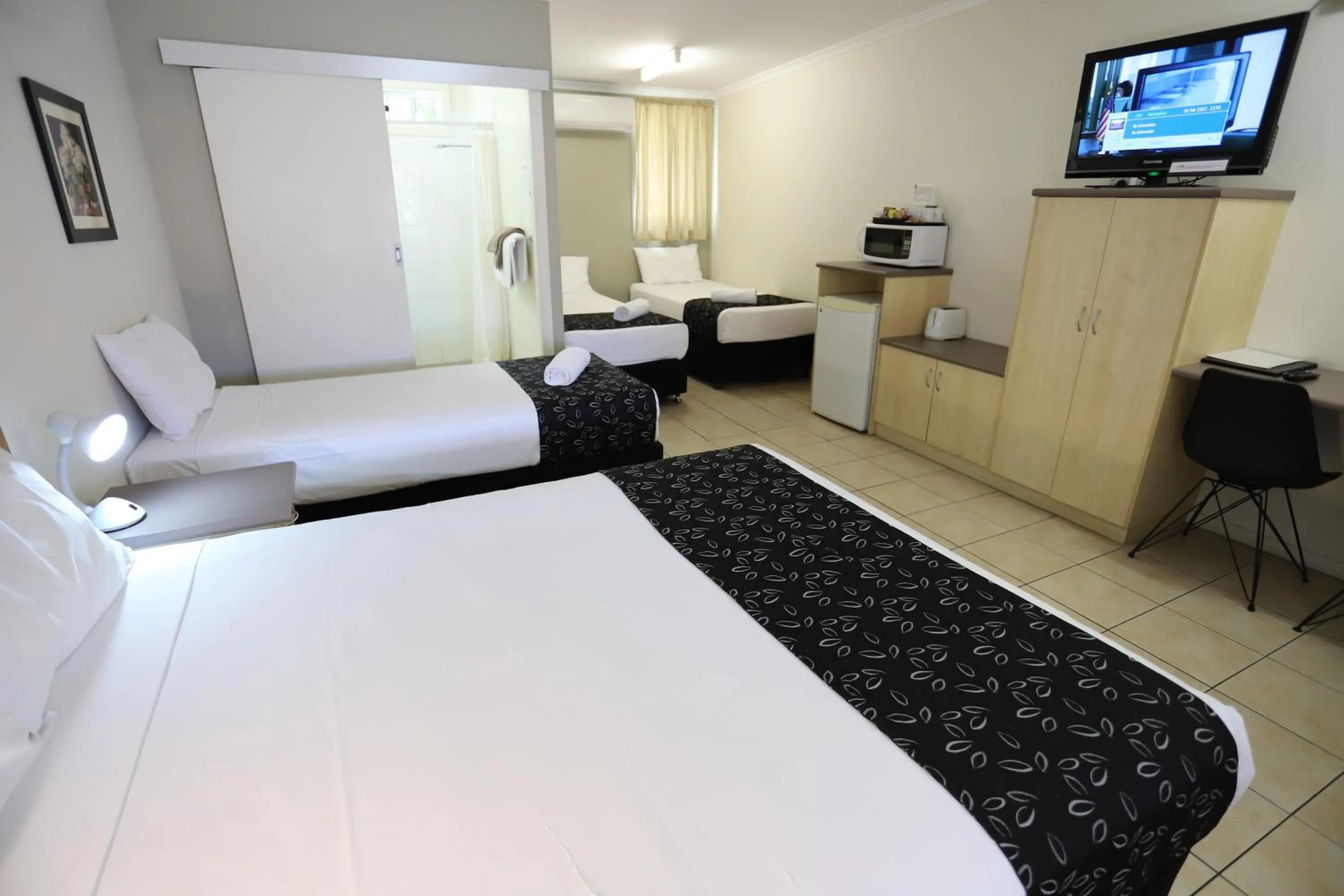 Bed in Tropic Coast Motel