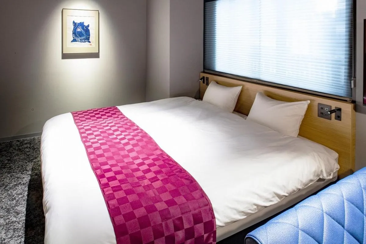 Bed in ALPHABED INN Sapporo Odori Park