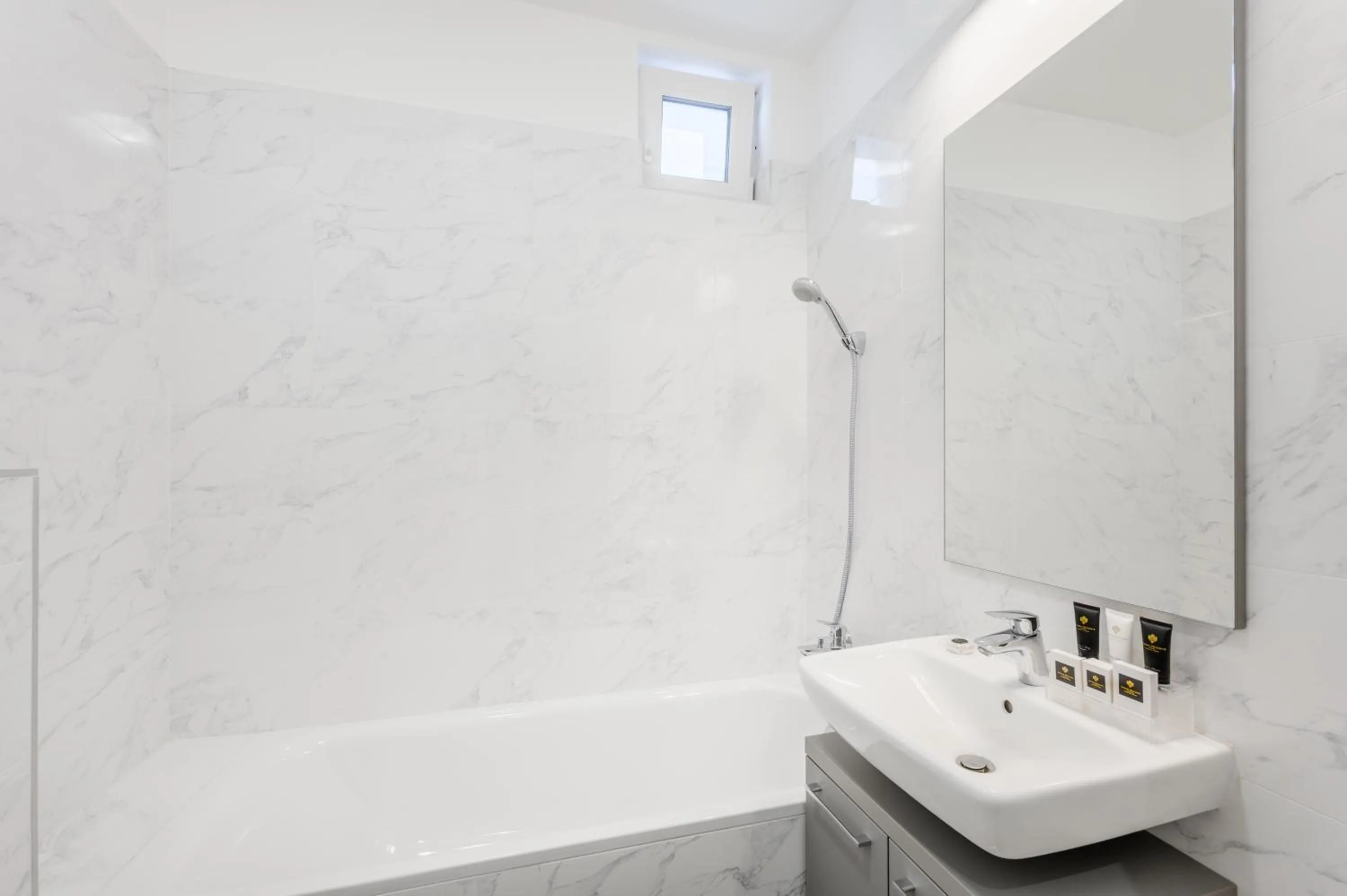 Shower in Elisabeth Downtown Apartments by FirstHost