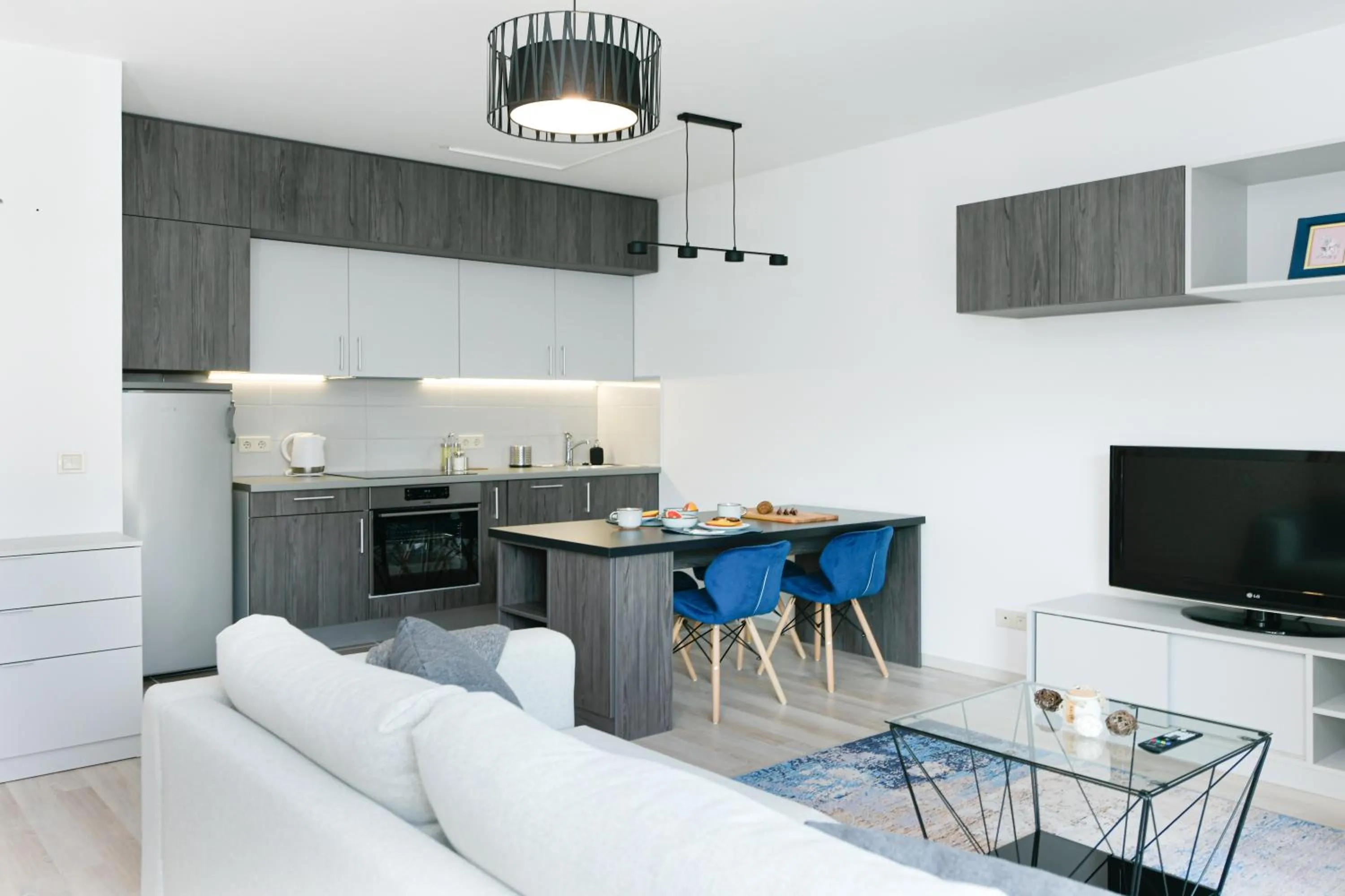 Communal lounge/ TV room in Elisabeth Downtown Apartments by FirstHost