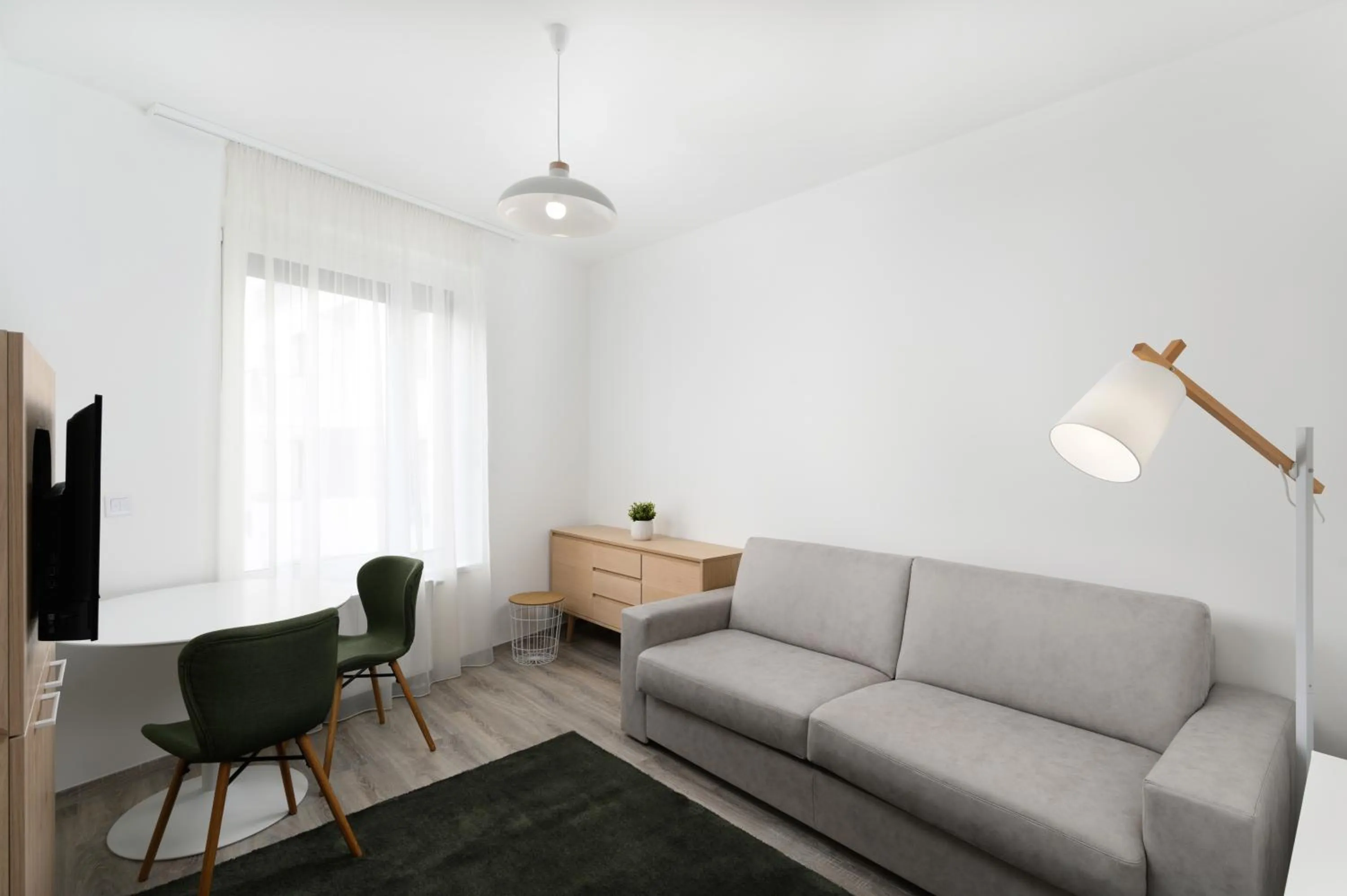 Communal lounge/ TV room in Elisabeth Downtown Apartments by FirstHost