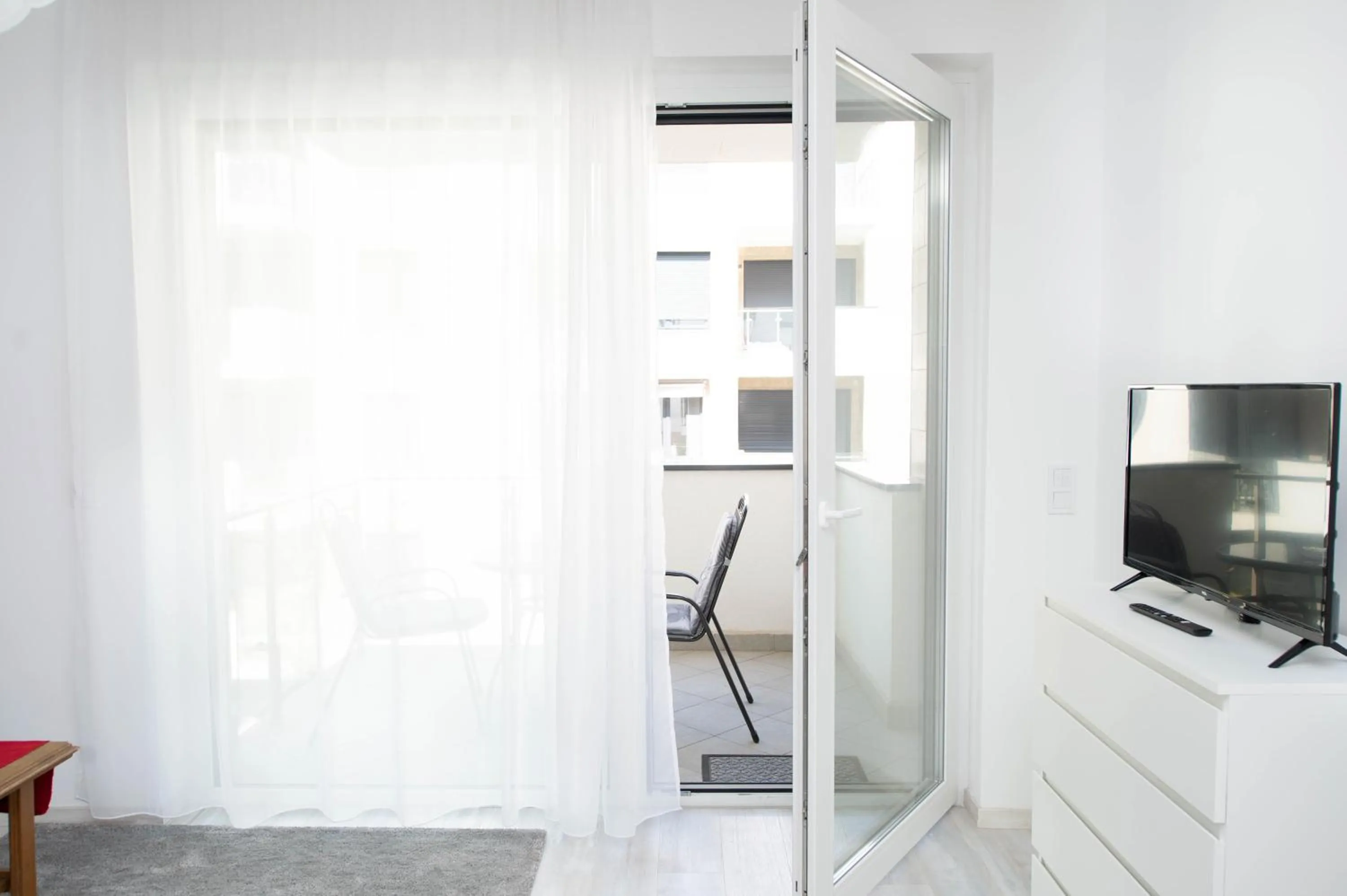 Communal lounge/ TV room in Elisabeth Downtown Apartments by FirstHost