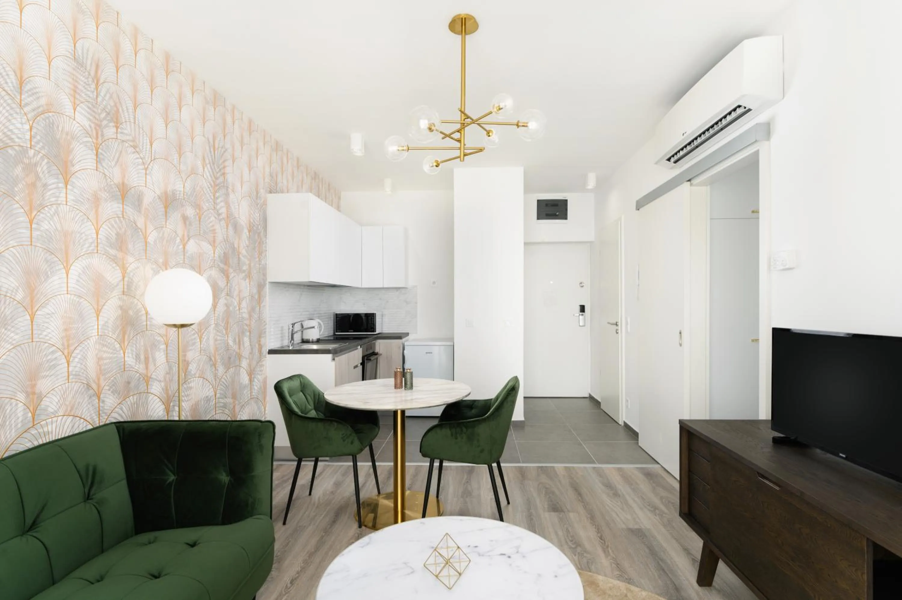 Communal lounge/ TV room in Elisabeth Downtown Apartments by FirstHost