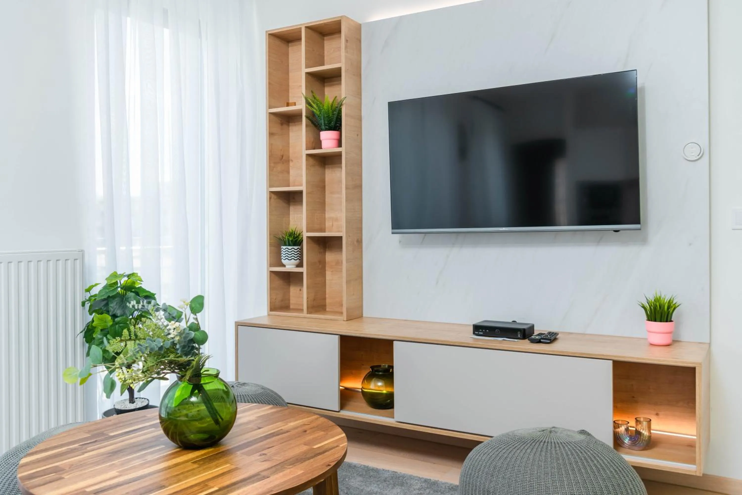 Communal lounge/ TV room in Elisabeth Downtown Apartments by FirstHost