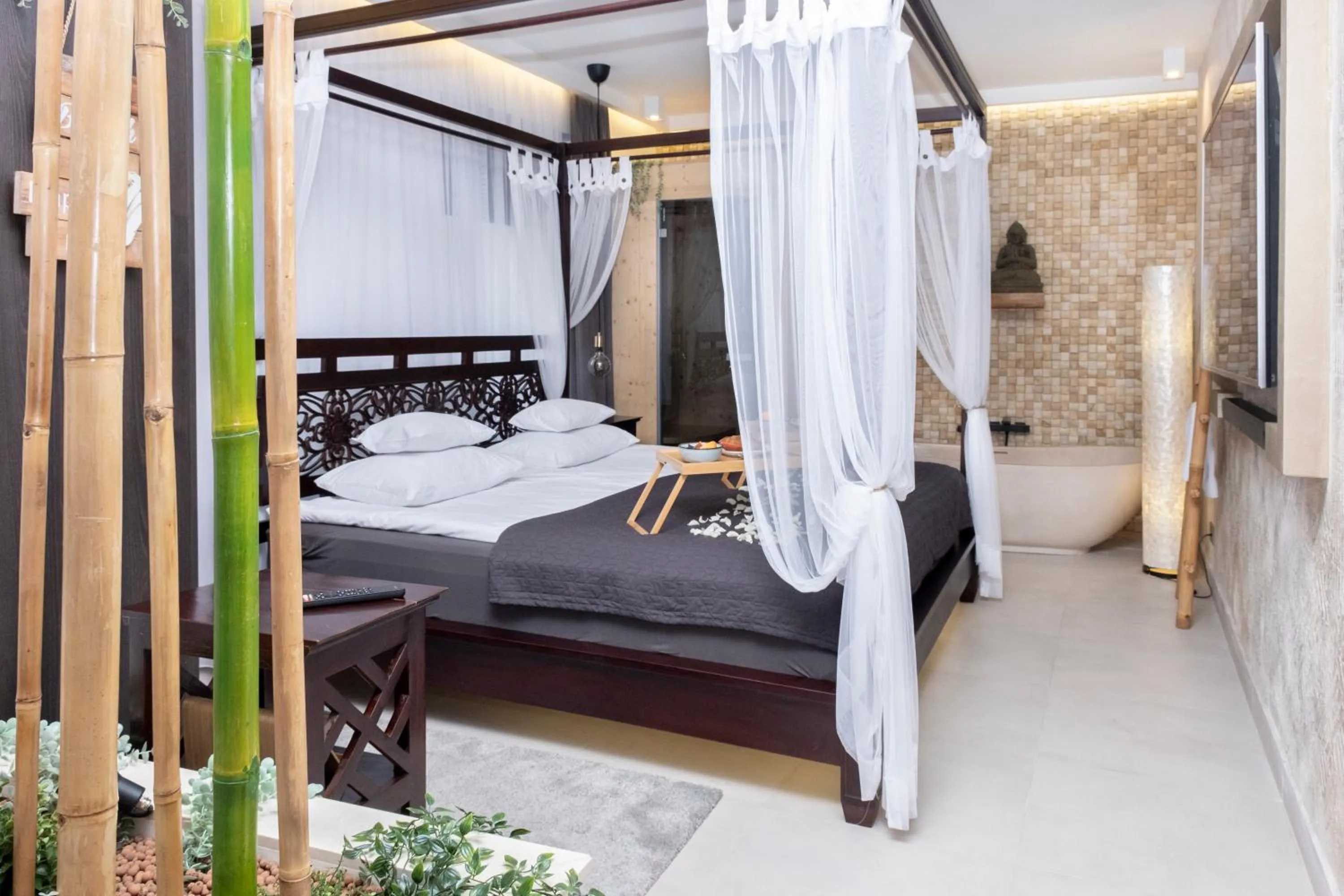 Bed in Elisabeth Downtown Apartments by FirstHost