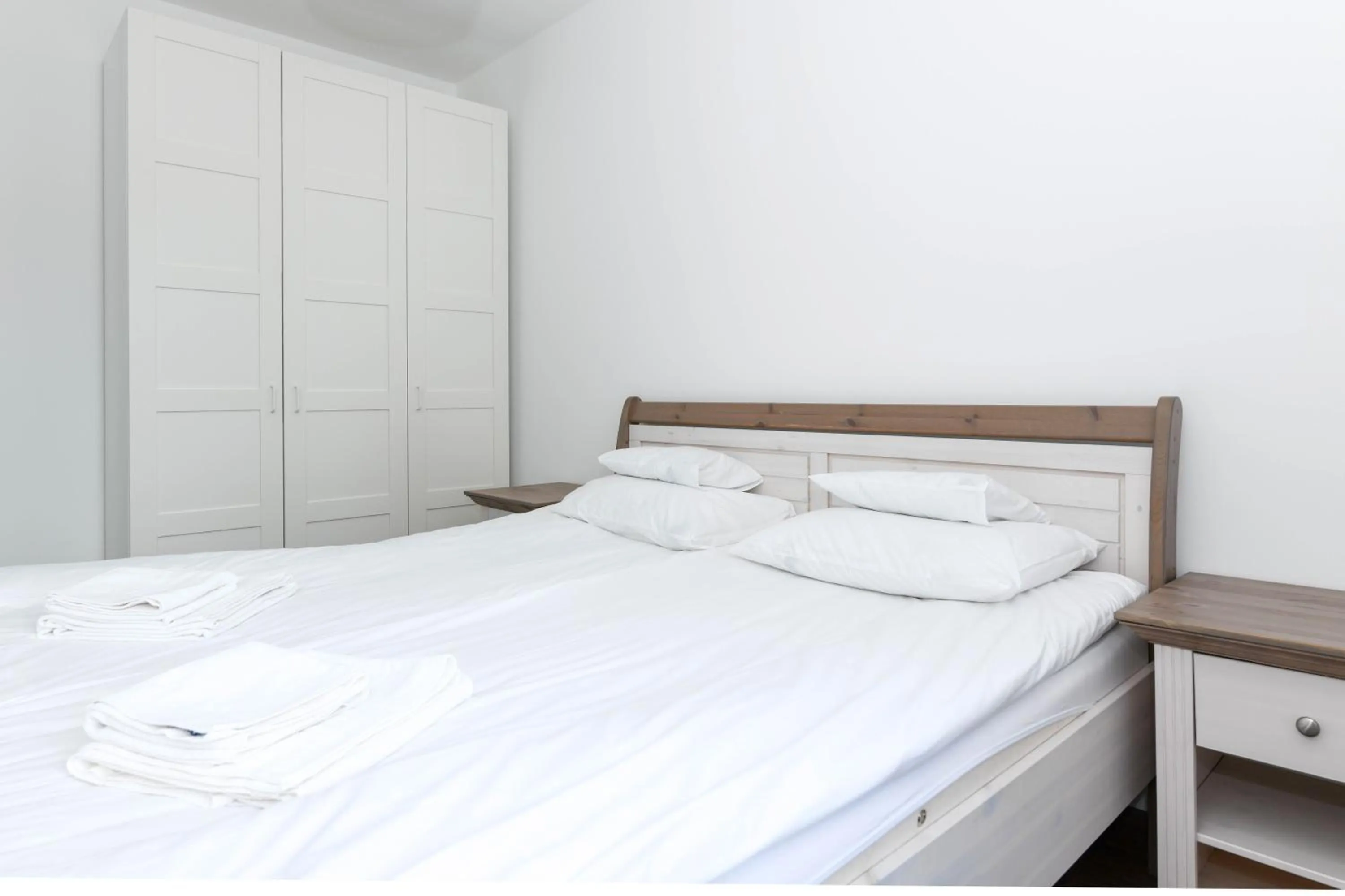 Bed in Elisabeth Downtown Apartments by FirstHost